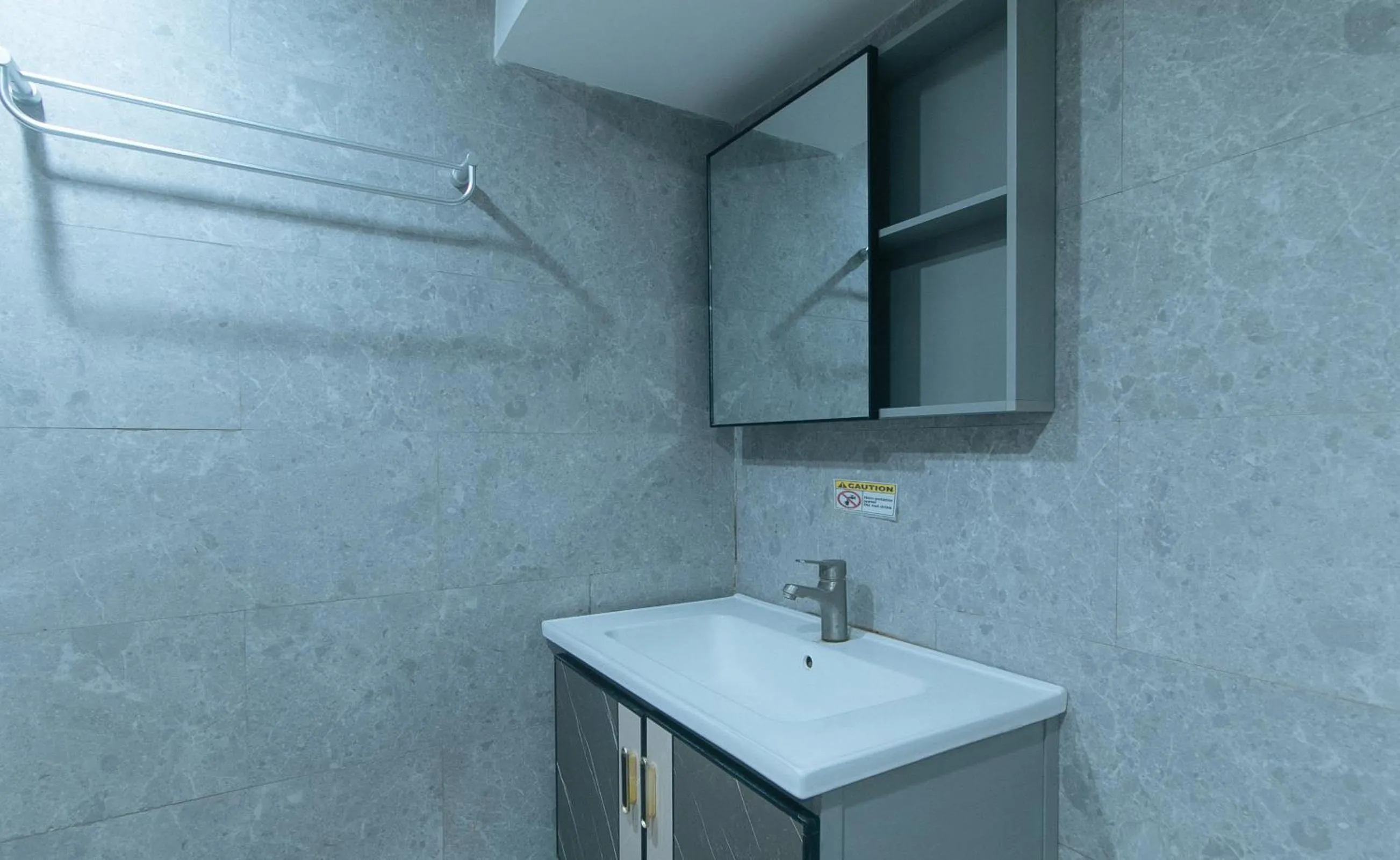 Bathroom in Rcee Place by RedDoorz