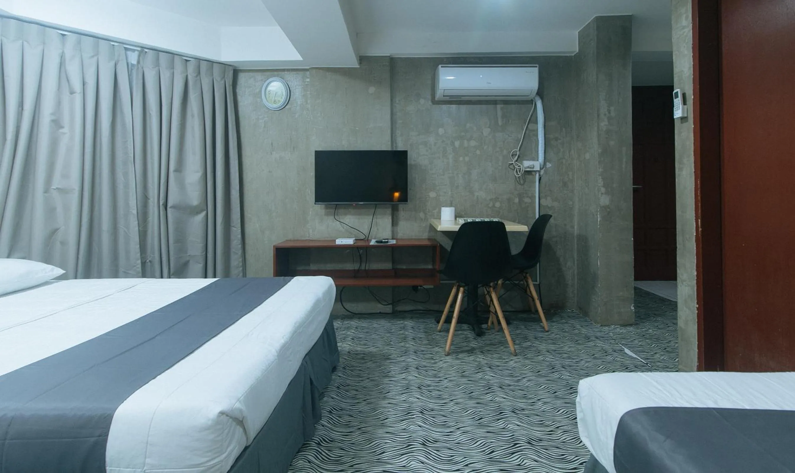 Bed in Rcee Place by RedDoorz