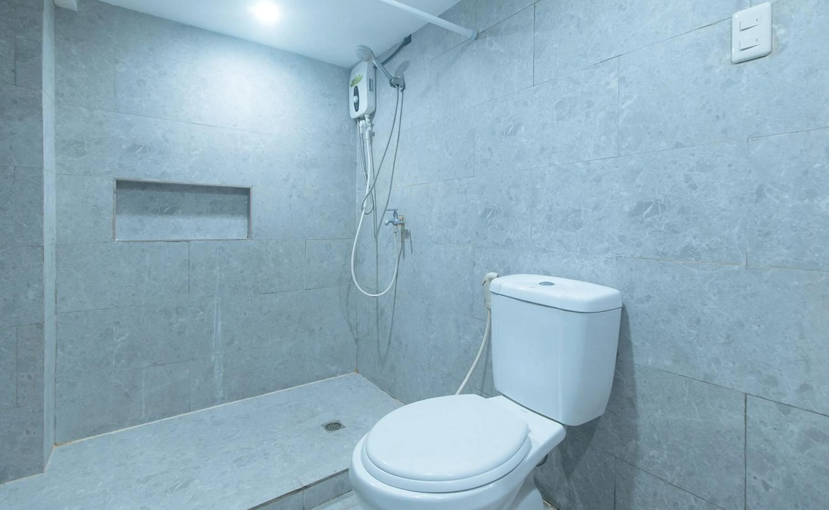 Shower in Rcee Place by RedDoorz