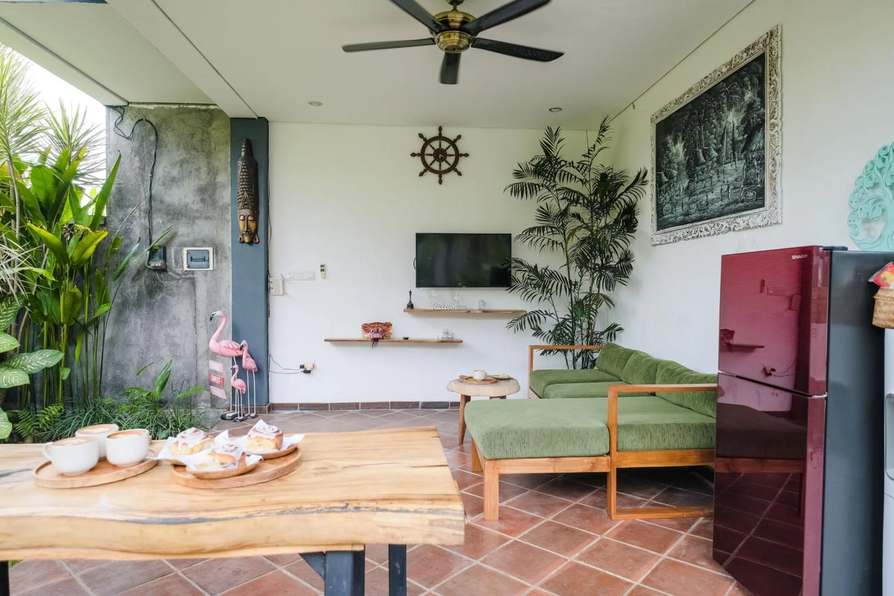 Communal lounge/ TV room in The Kumpi Bali by The Lavana