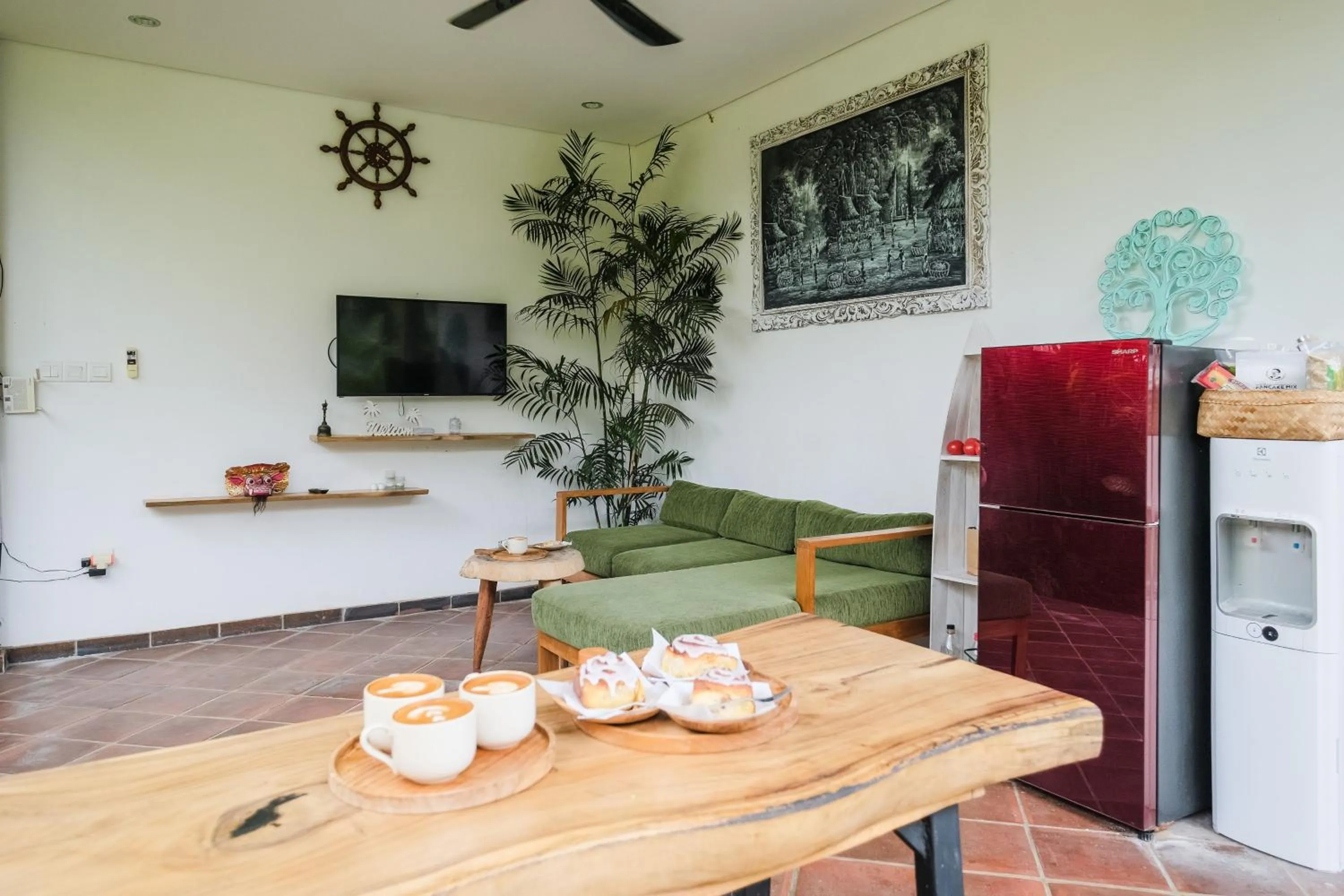 Communal lounge/ TV room in The Kumpi Bali by The Lavana