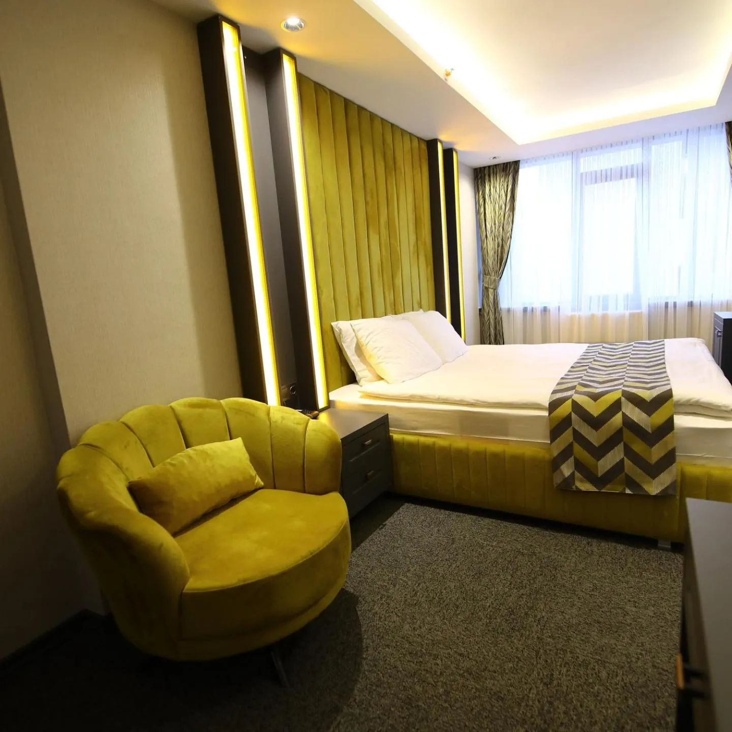 Bed in GRAND DORA HOTEL