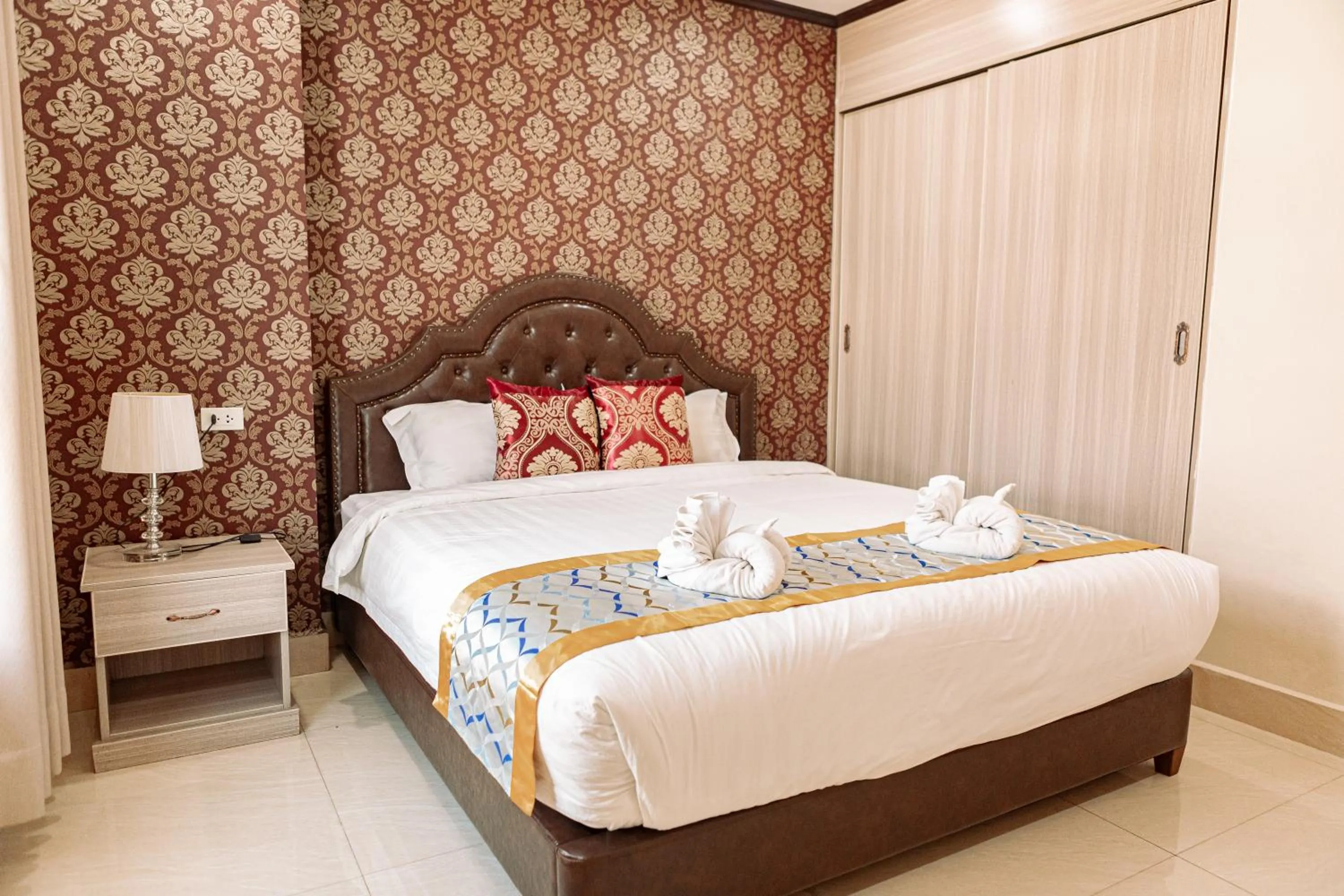 Bed in VANHSENG BOUTIQUE VIENTIANE HOTEL