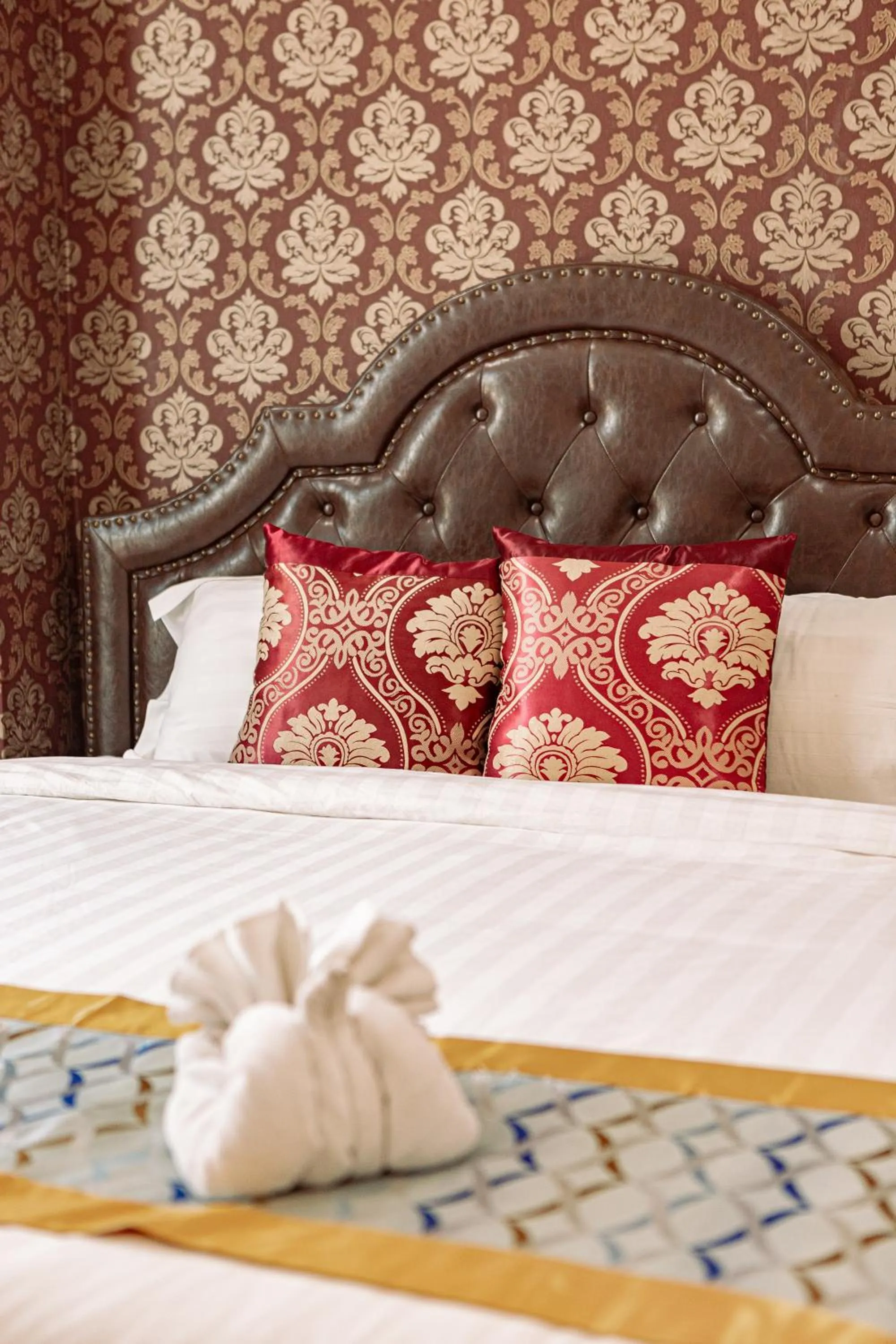 Bed in VANHSENG BOUTIQUE VIENTIANE HOTEL