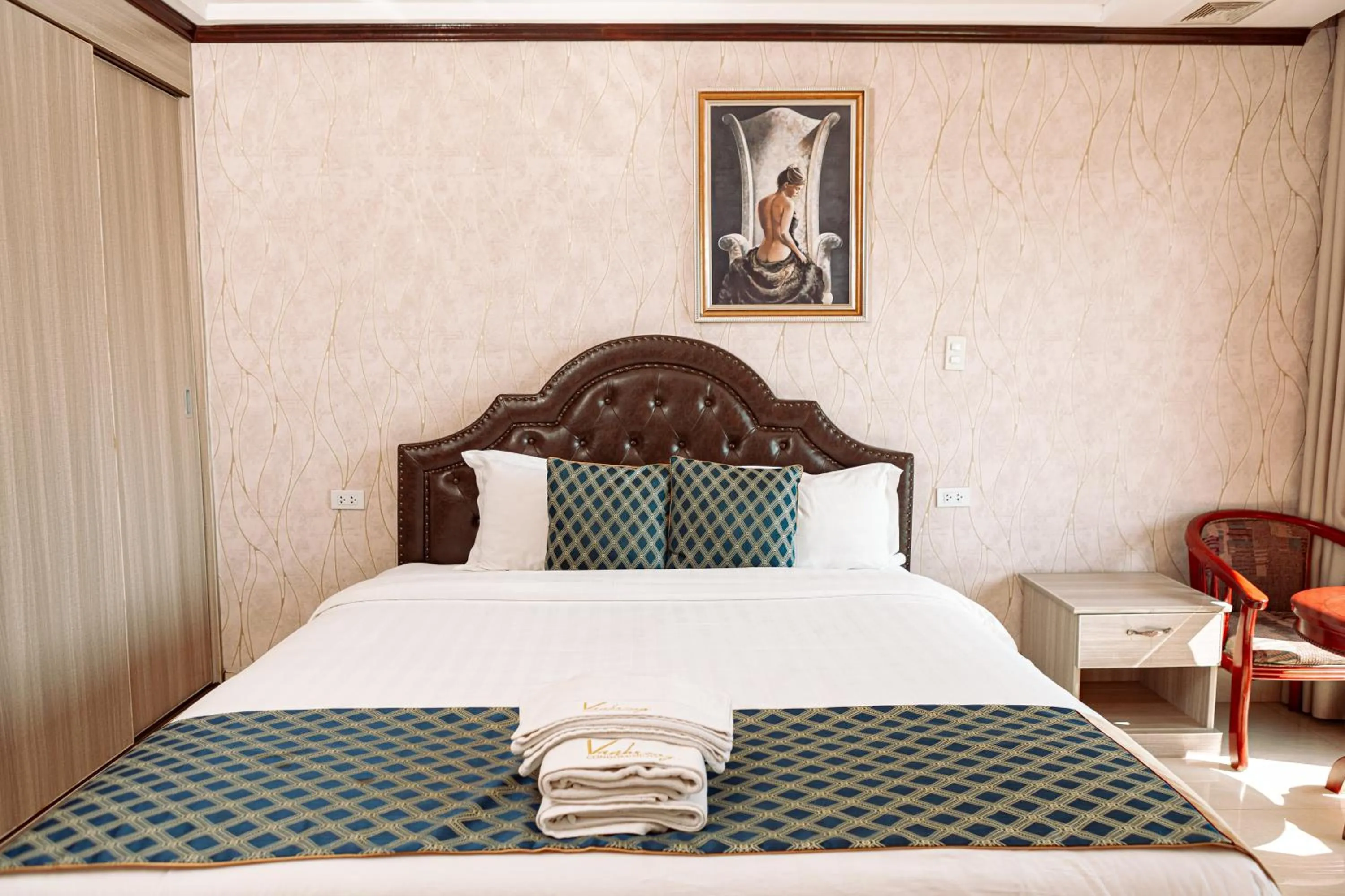 Bed in VANHSENG BOUTIQUE VIENTIANE HOTEL