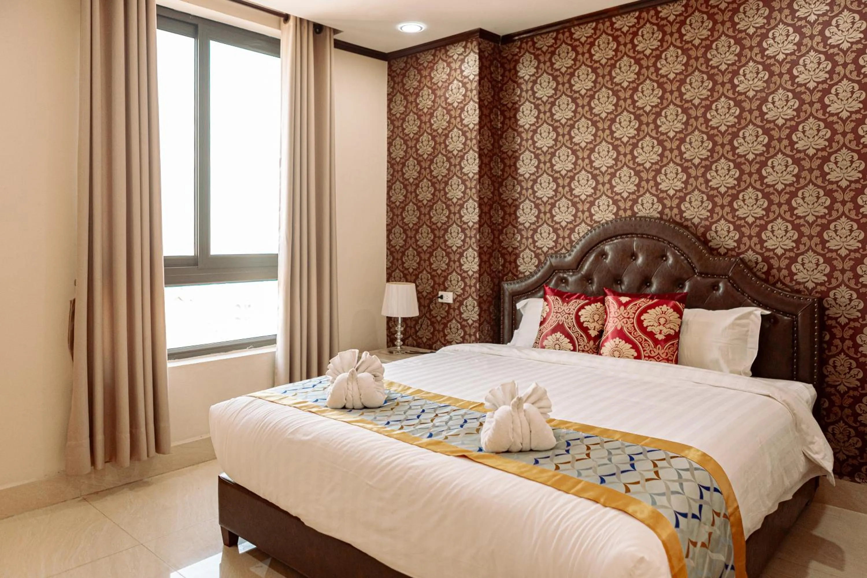 Bed in VANHSENG BOUTIQUE VIENTIANE HOTEL