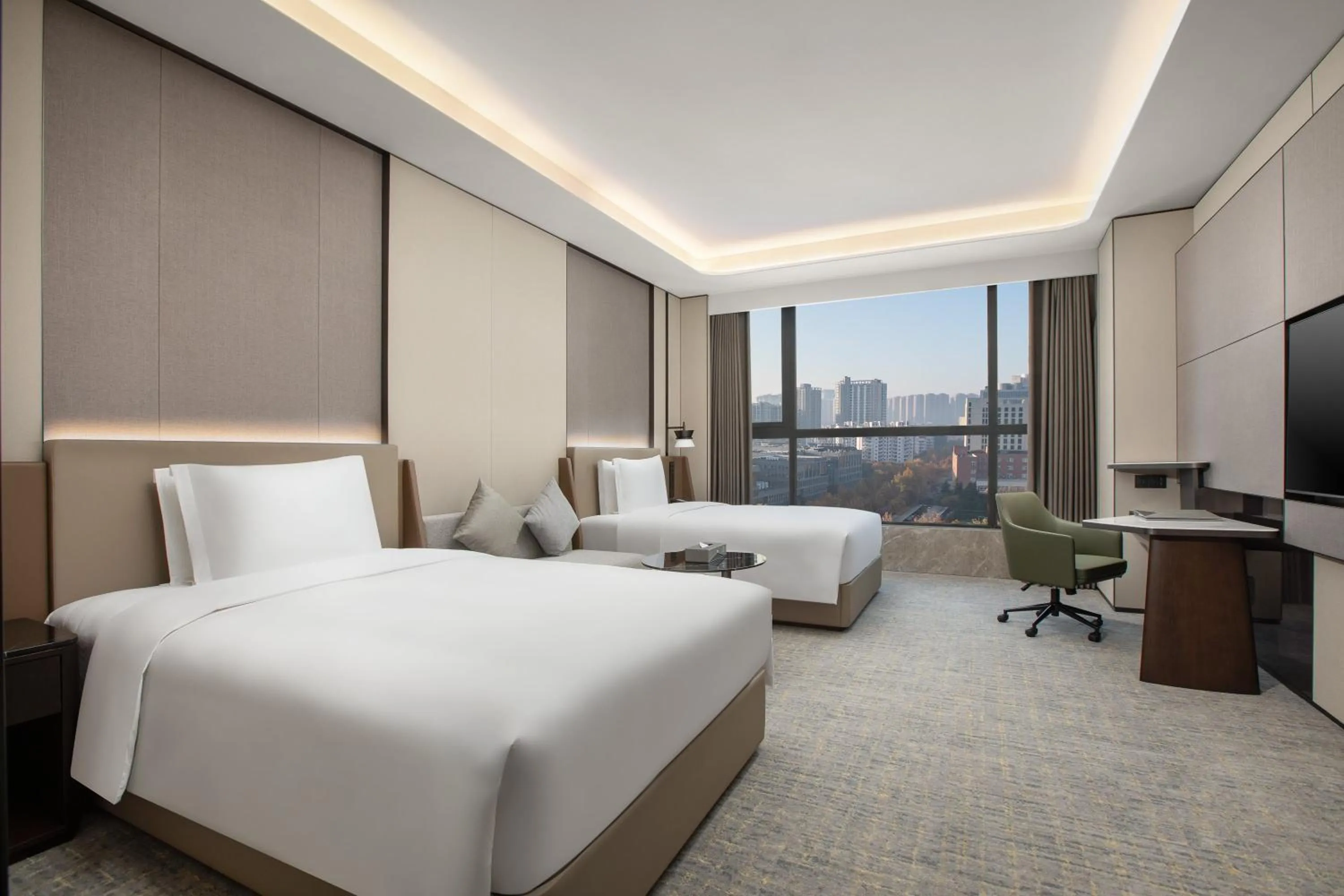 Photo of the whole room, Bed in Crowne Plaza Zhengzhou High Tech Zone by IHG
