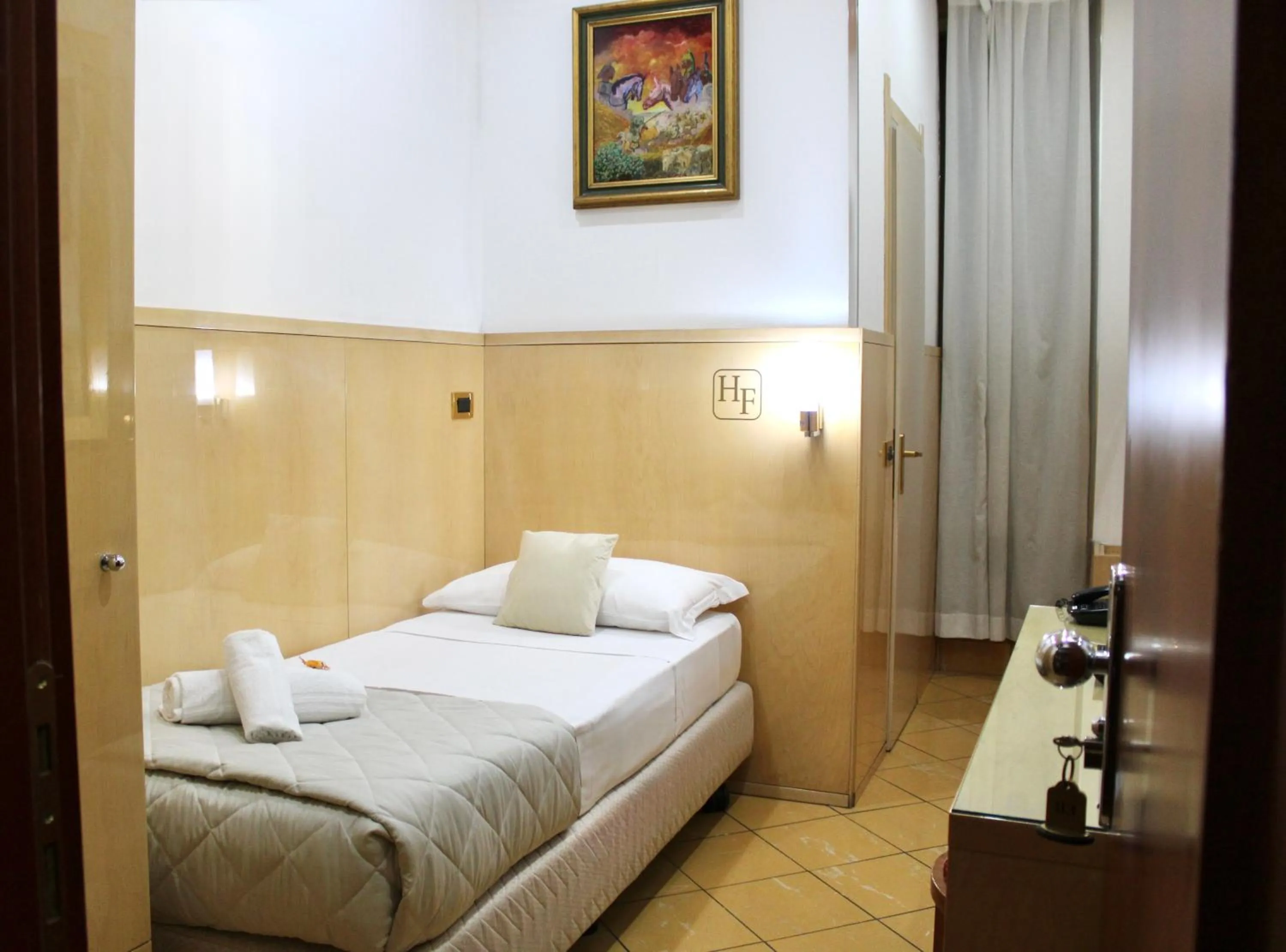 Photo of the whole room, Bed in Hotel Fiorella Milano