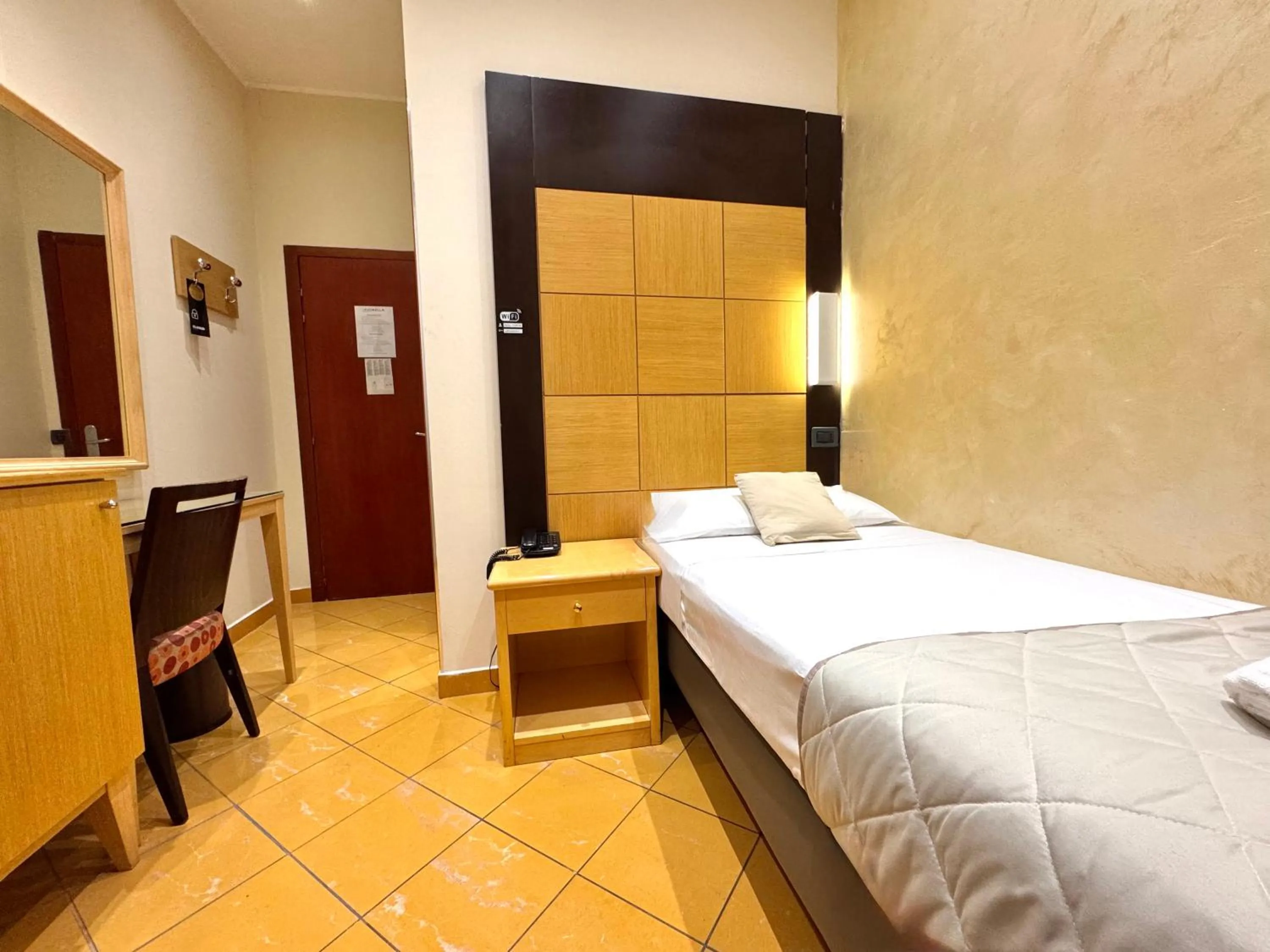 Bedroom, Bed in Hotel Fiorella Milano