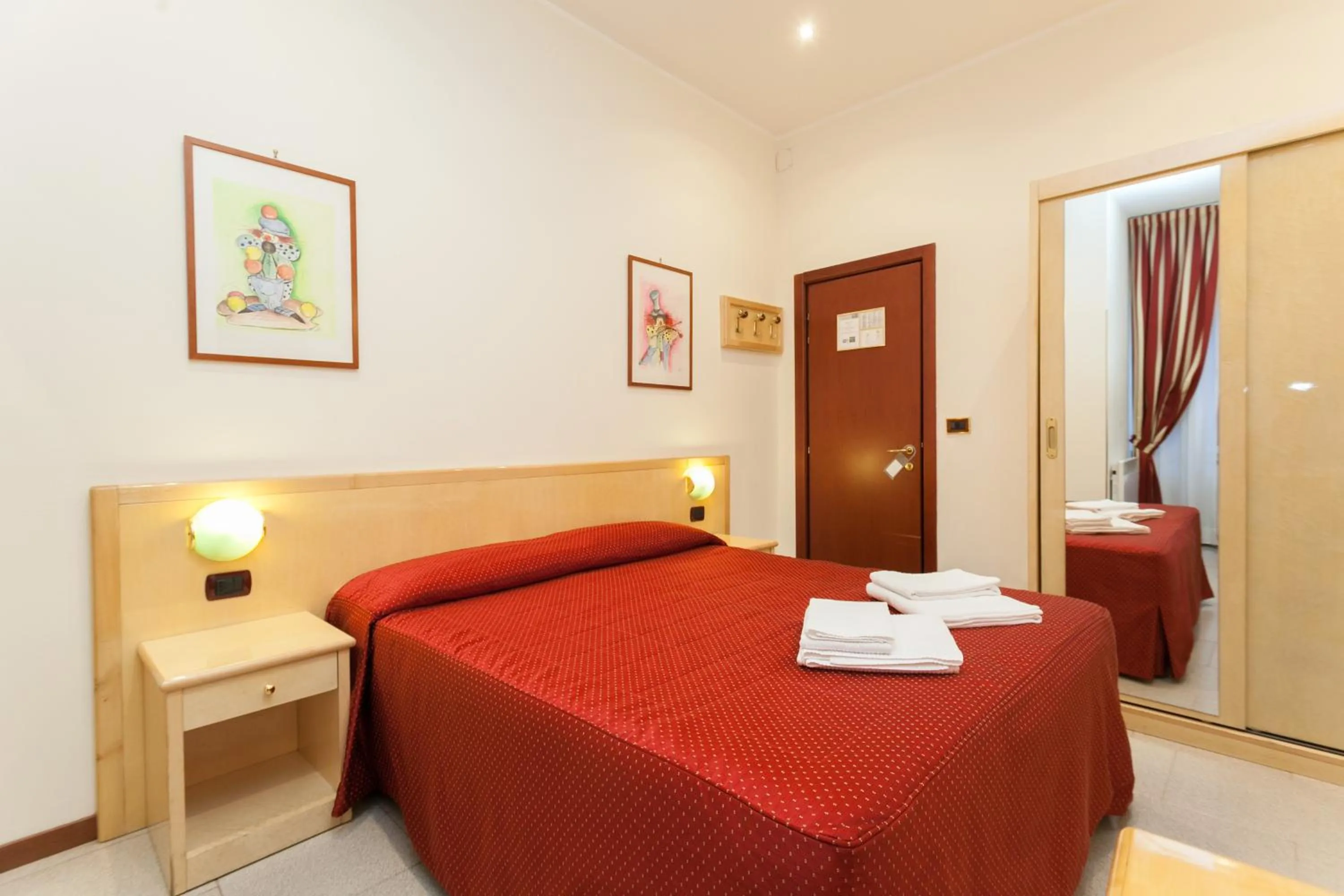 Photo of the whole room, Bed in Hotel Fiorella Milano