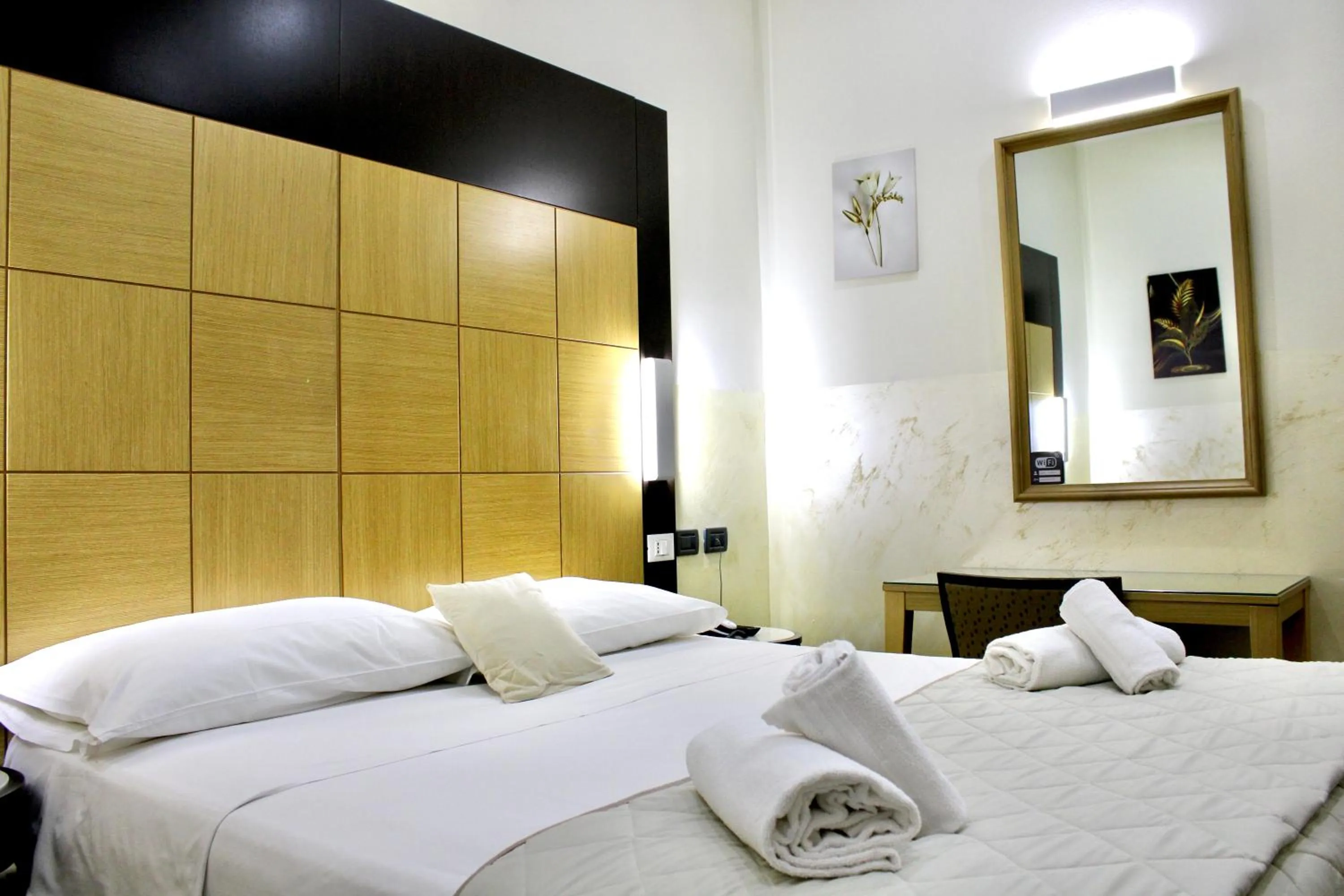 Photo of the whole room, Bed in Hotel Fiorella Milano