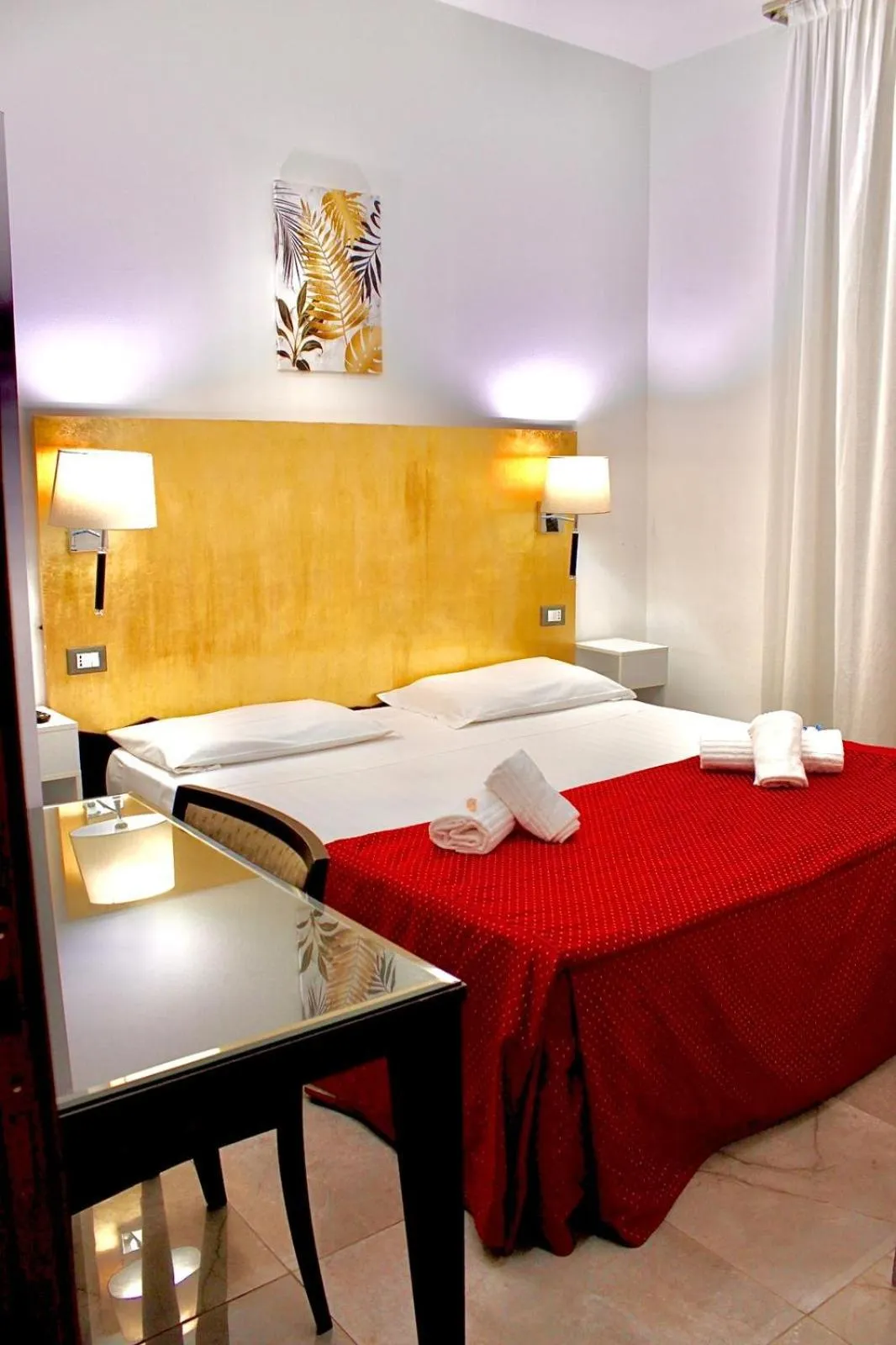 Photo of the whole room, Bed in Hotel Fiorella Milano