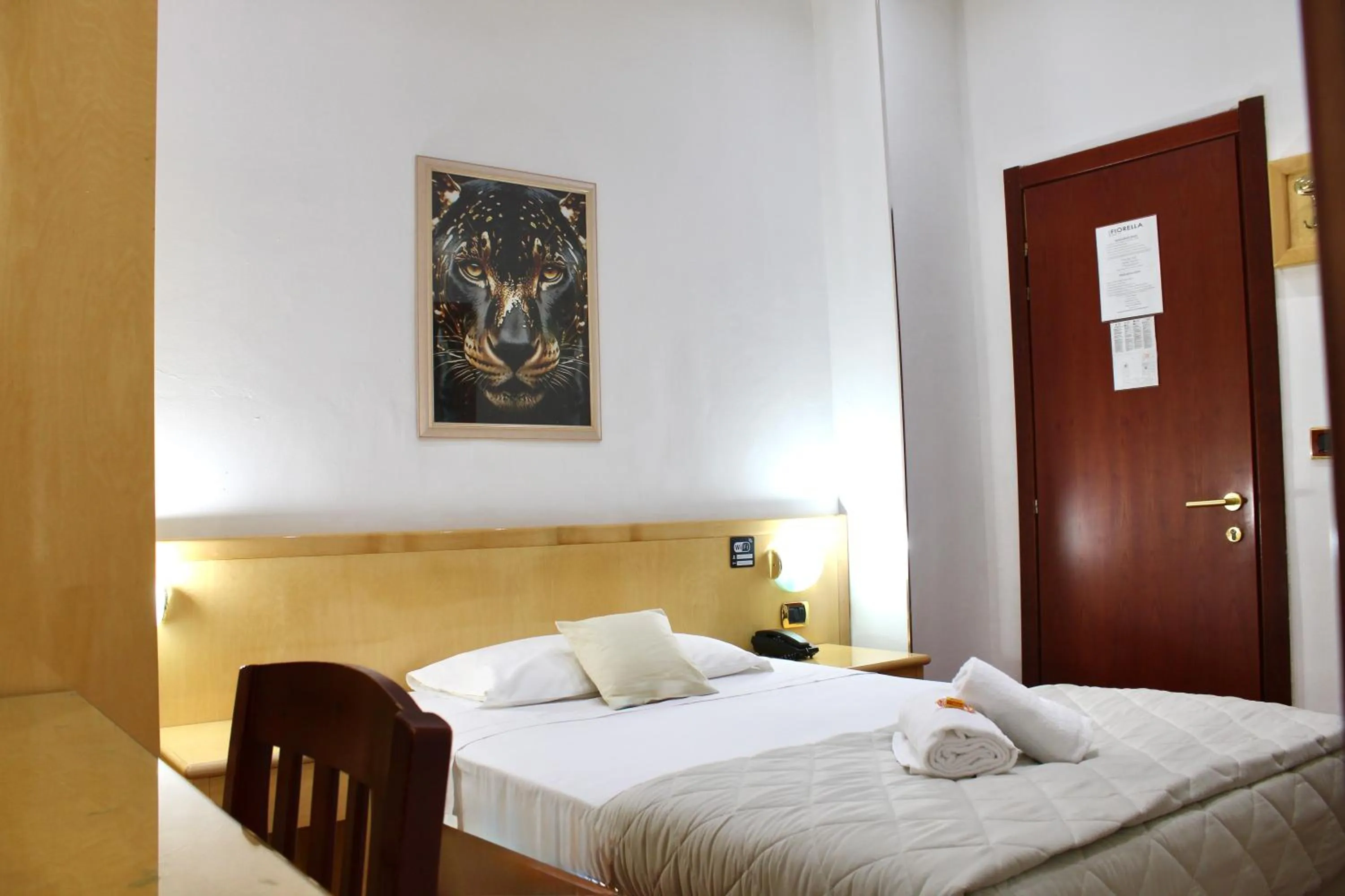 Photo of the whole room, Bed in Hotel Fiorella Milano