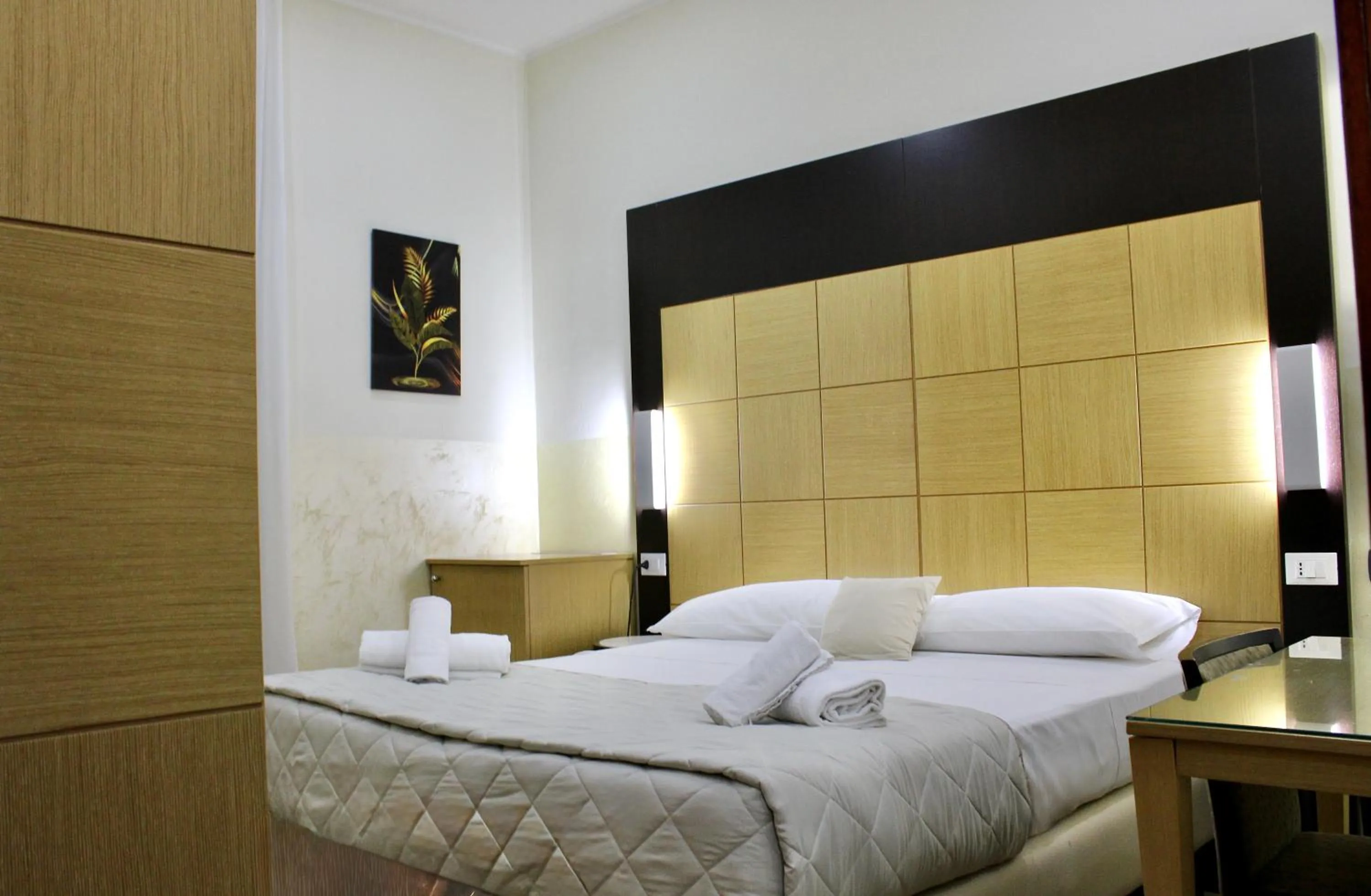 Photo of the whole room, Bed in Hotel Fiorella Milano