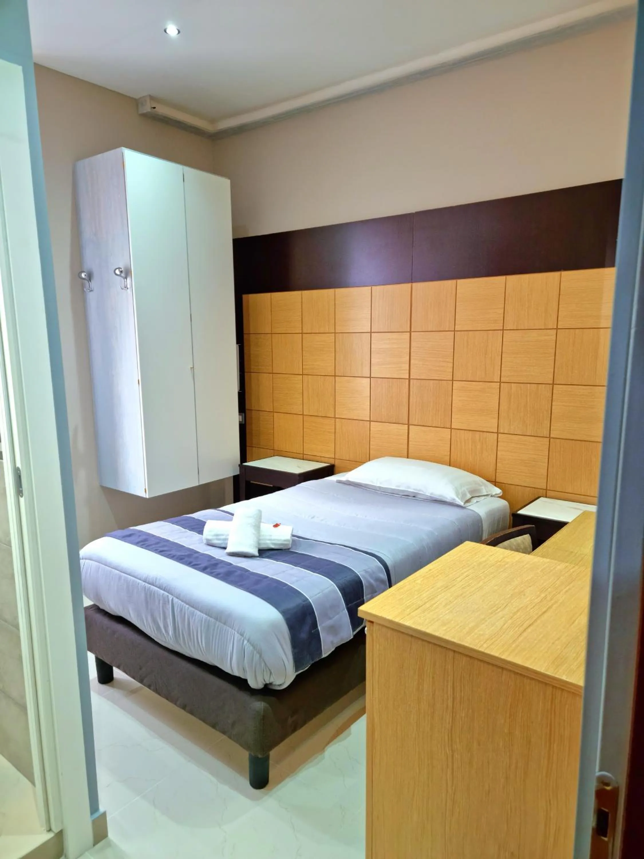 Bedroom, Bed in Hotel Fiorella Milano