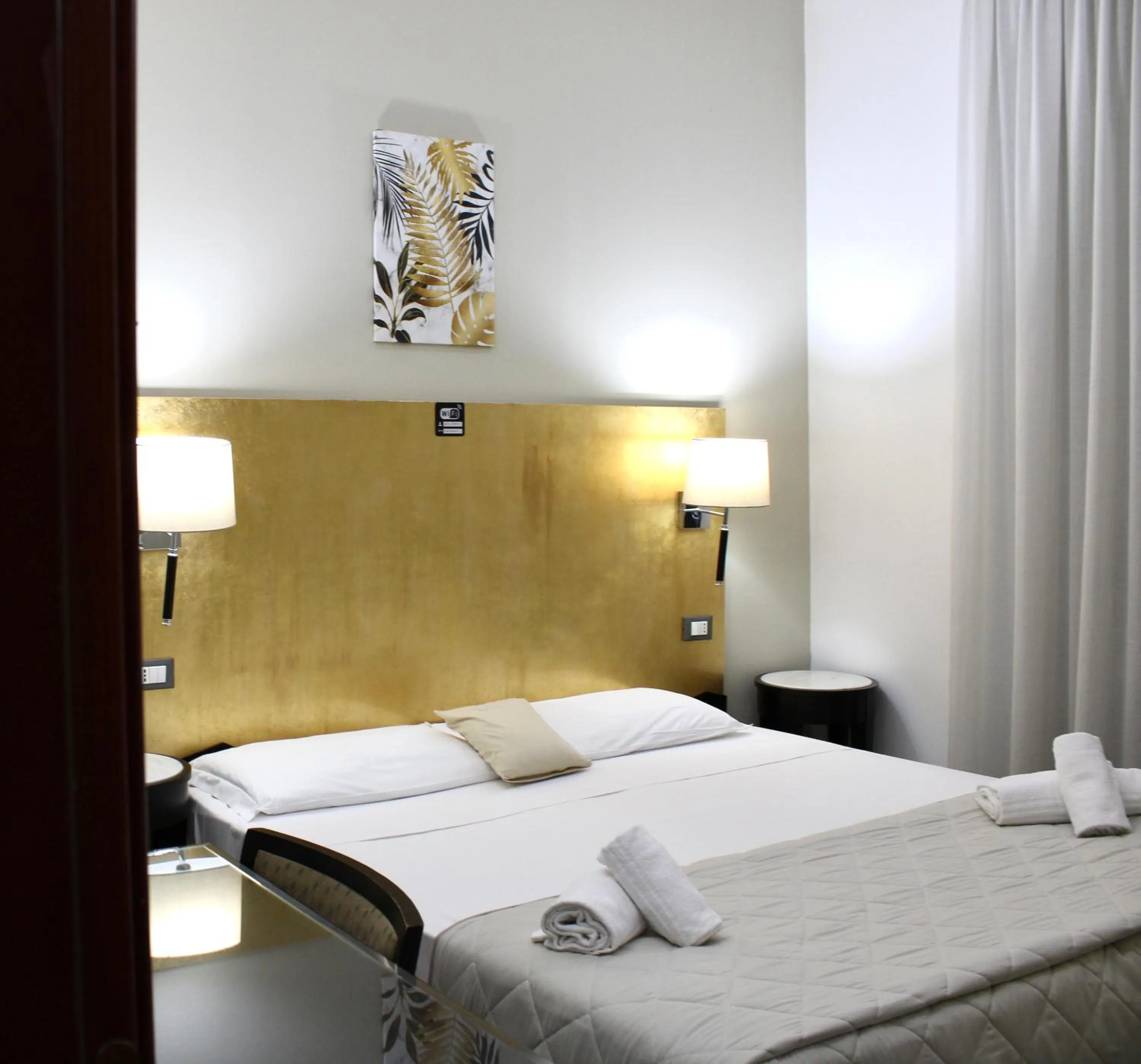 Photo of the whole room, Bed in Hotel Fiorella Milano