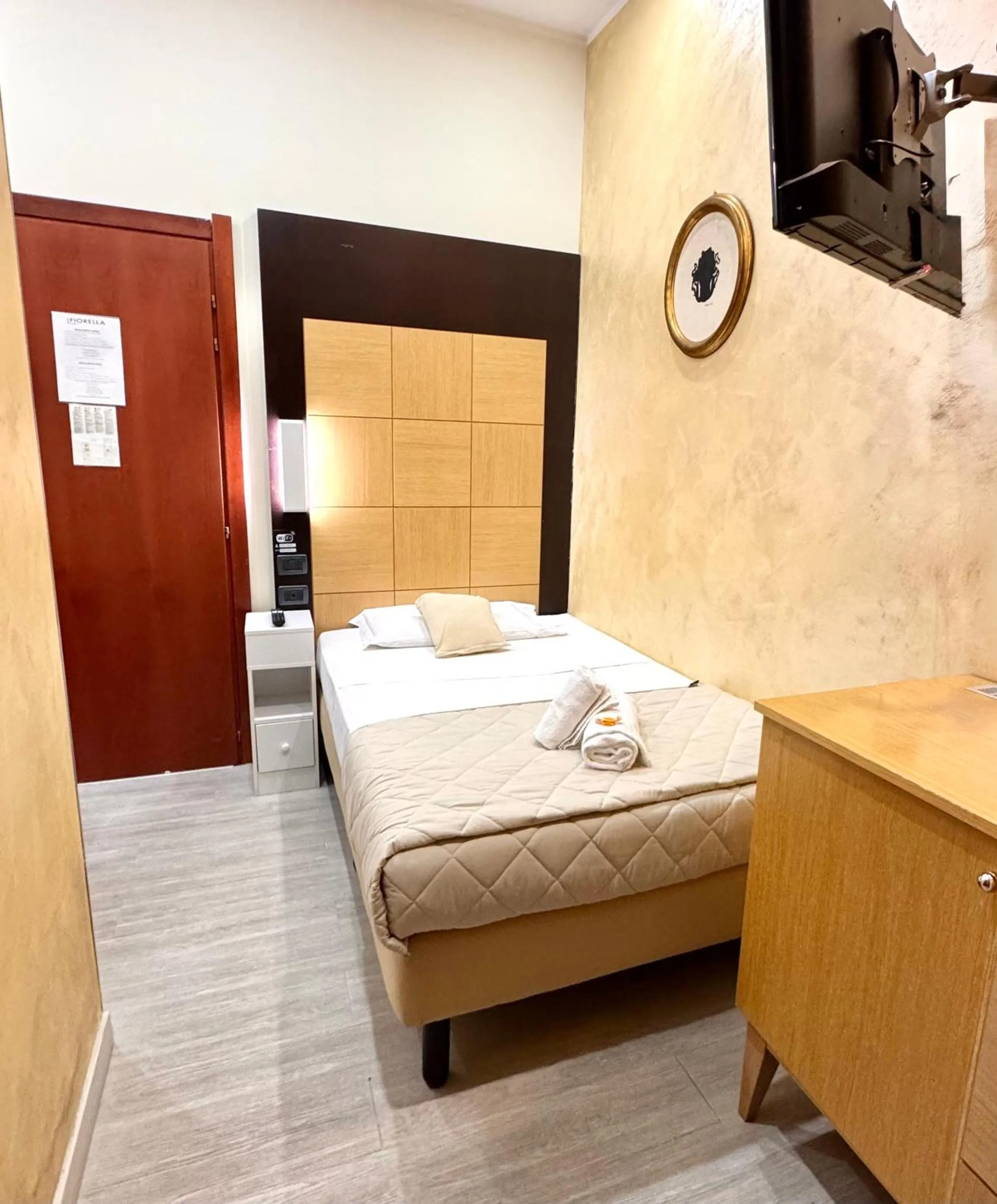 Photo of the whole room, Bed in Hotel Fiorella Milano