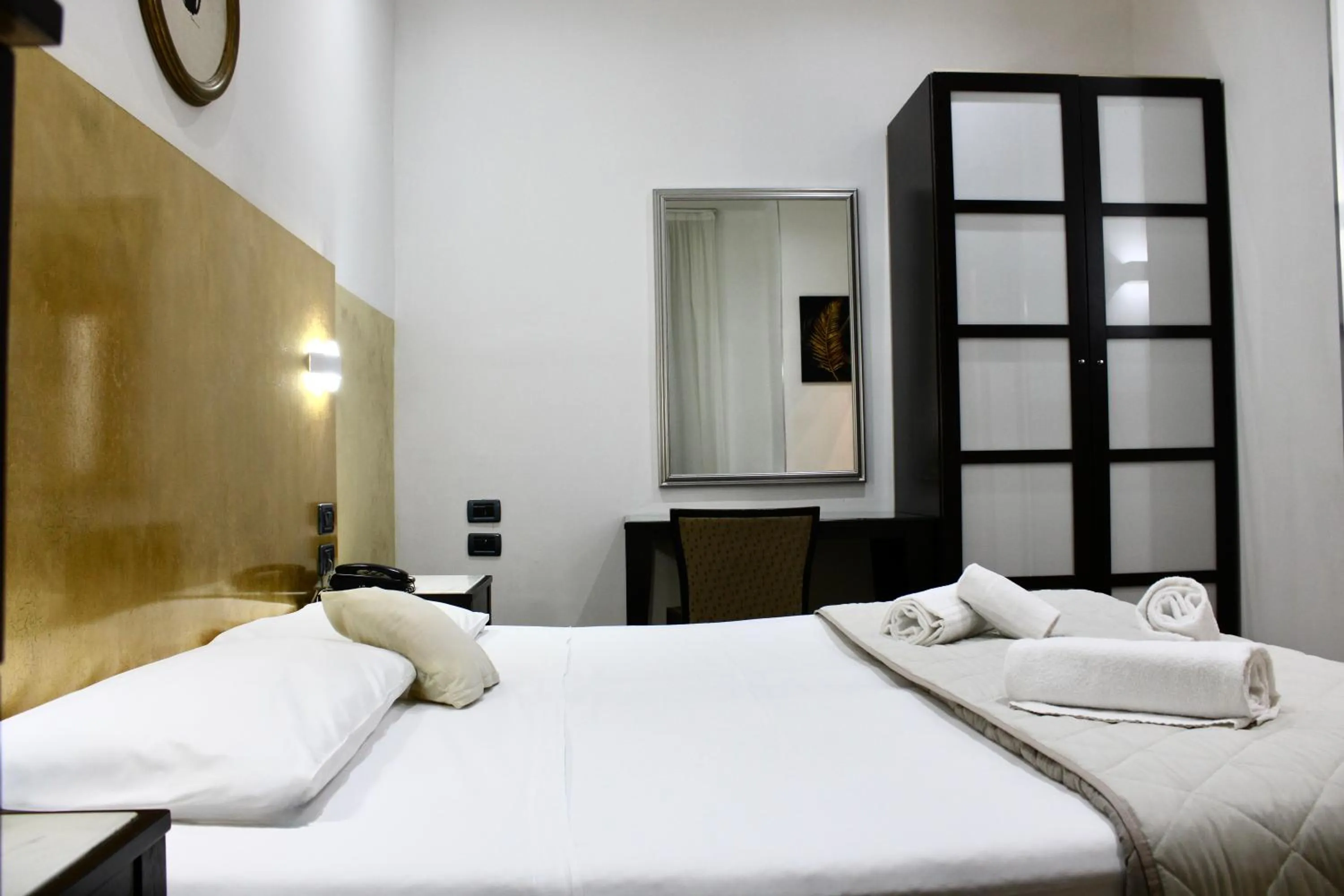 Photo of the whole room, Bed in Hotel Fiorella Milano