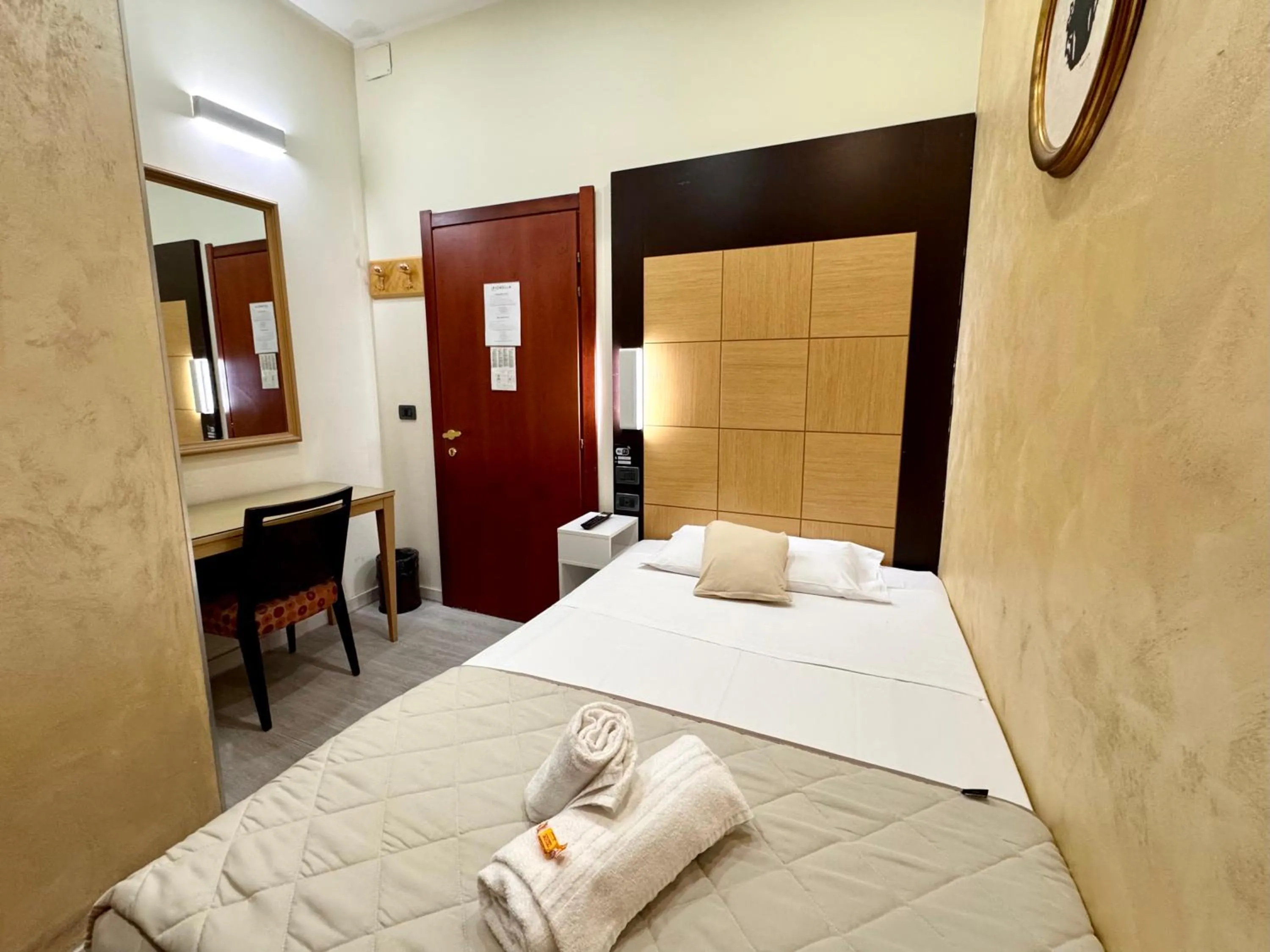 Photo of the whole room, Bed in Hotel Fiorella Milano