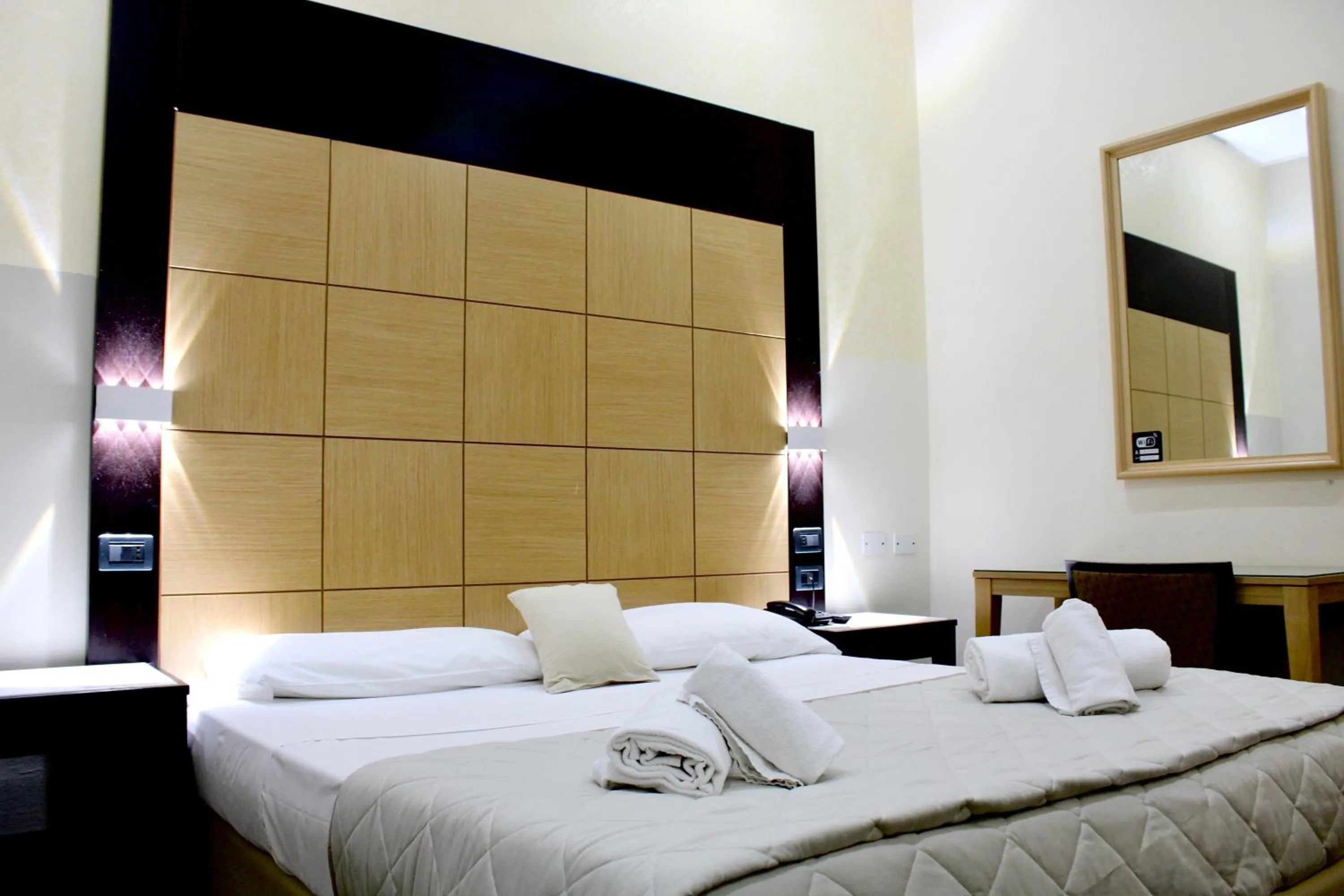 Photo of the whole room, Bed in Hotel Fiorella Milano