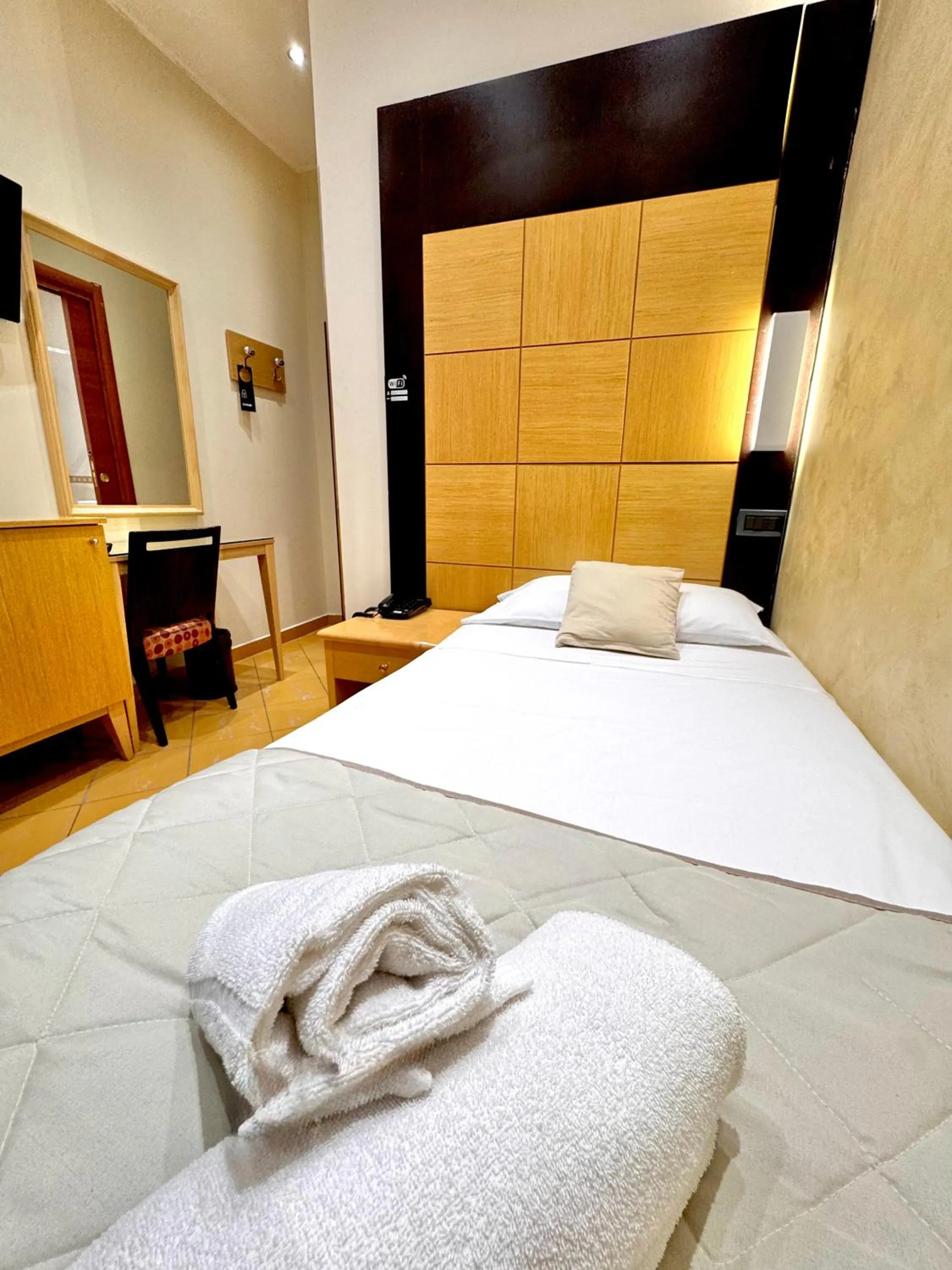 Bedroom, Bed in Hotel Fiorella Milano