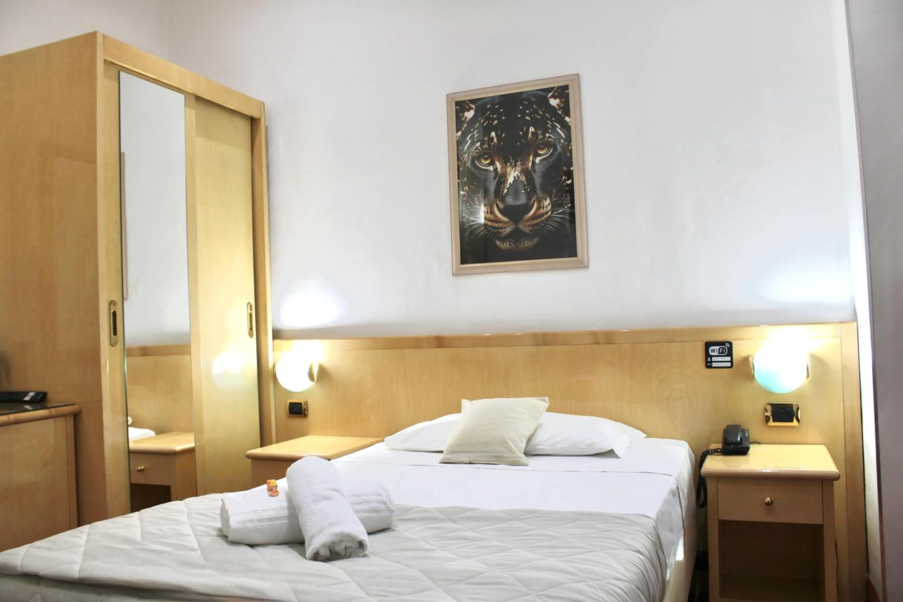 Photo of the whole room, Bed in Hotel Fiorella Milano