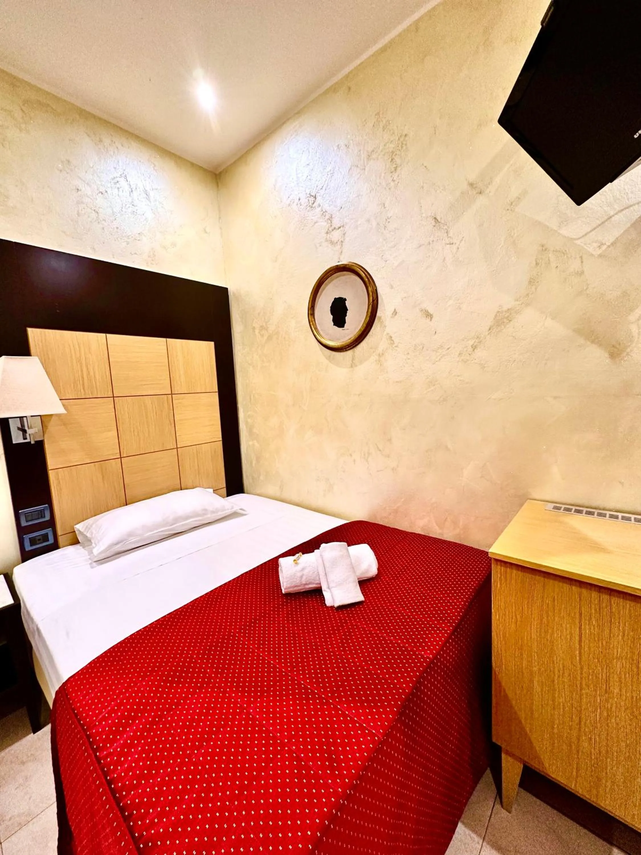 Photo of the whole room, Bed in Hotel Fiorella Milano