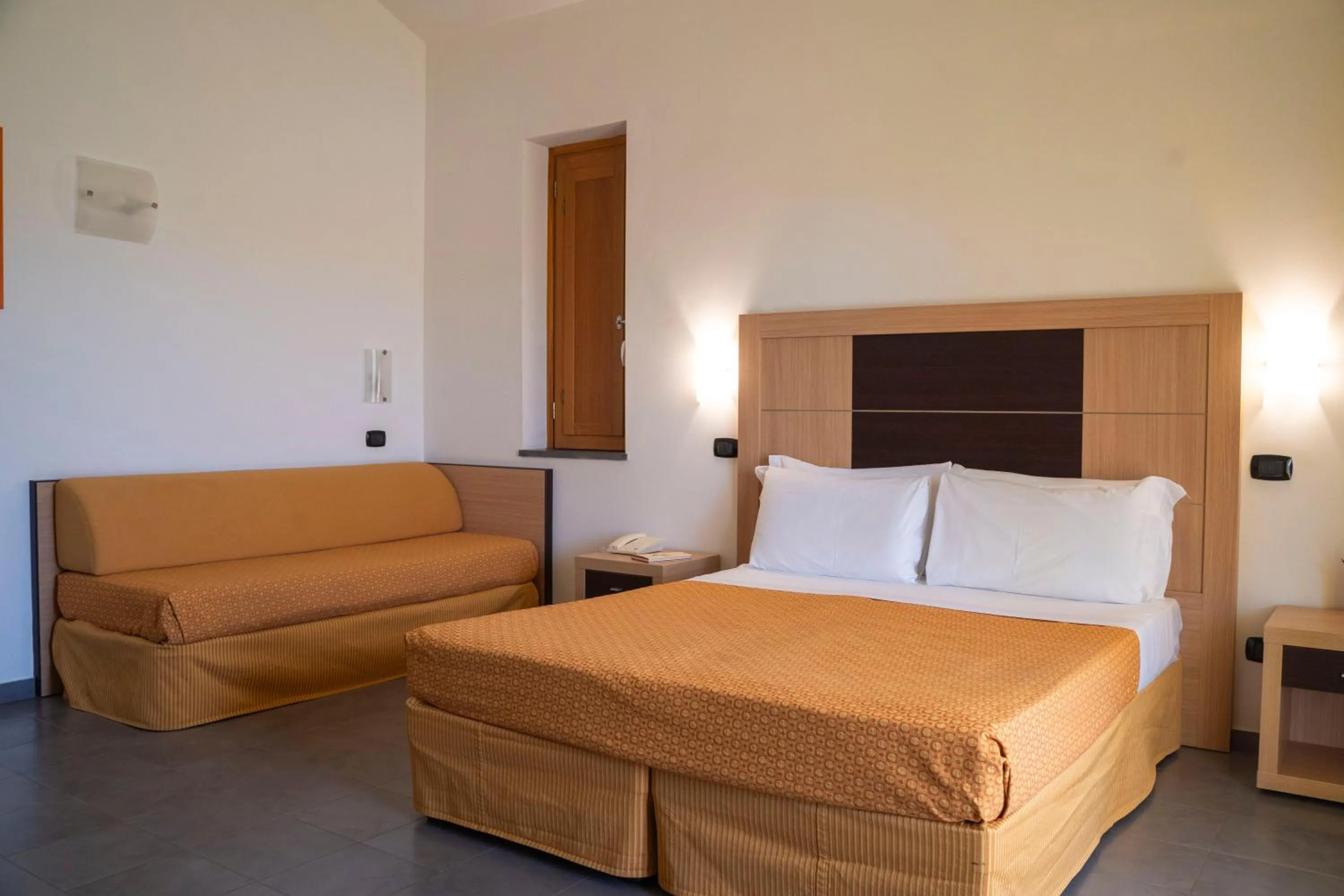 Bedroom, Bed in VOI Baia di Tindari Resort