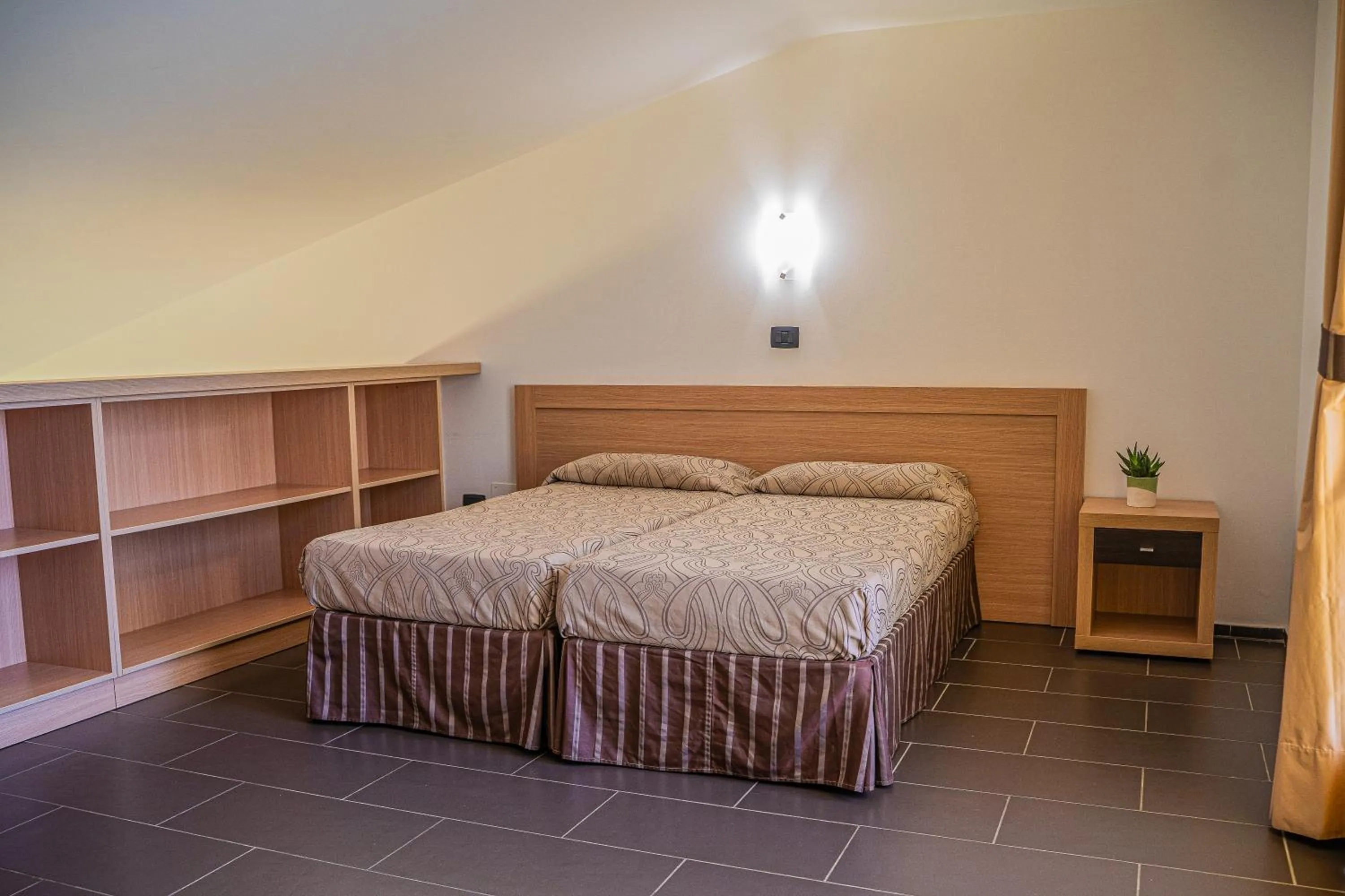 Bedroom, Bed in VOI Baia di Tindari Resort