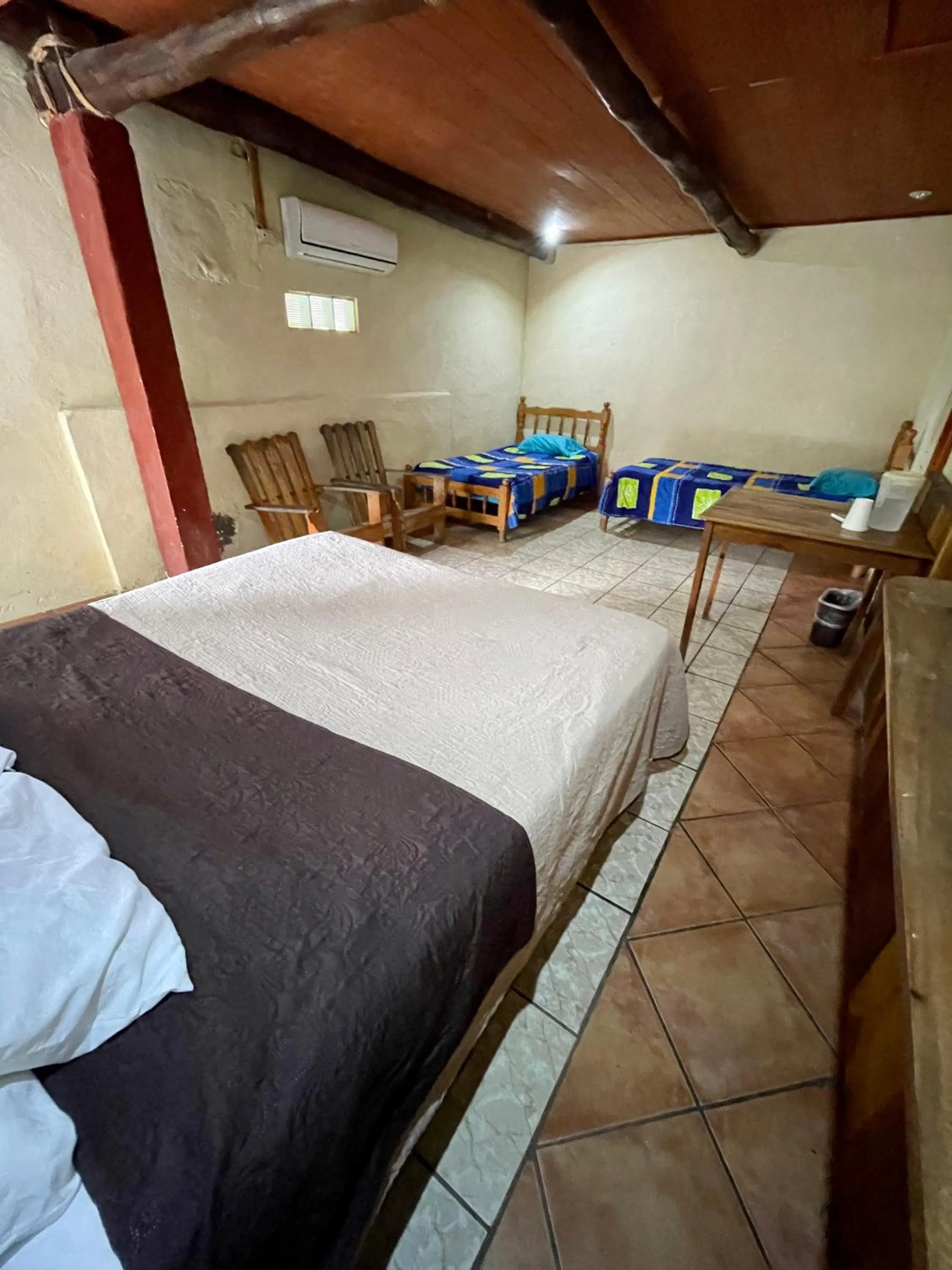 air conditioner, Bed in Johnnys Place Hotel