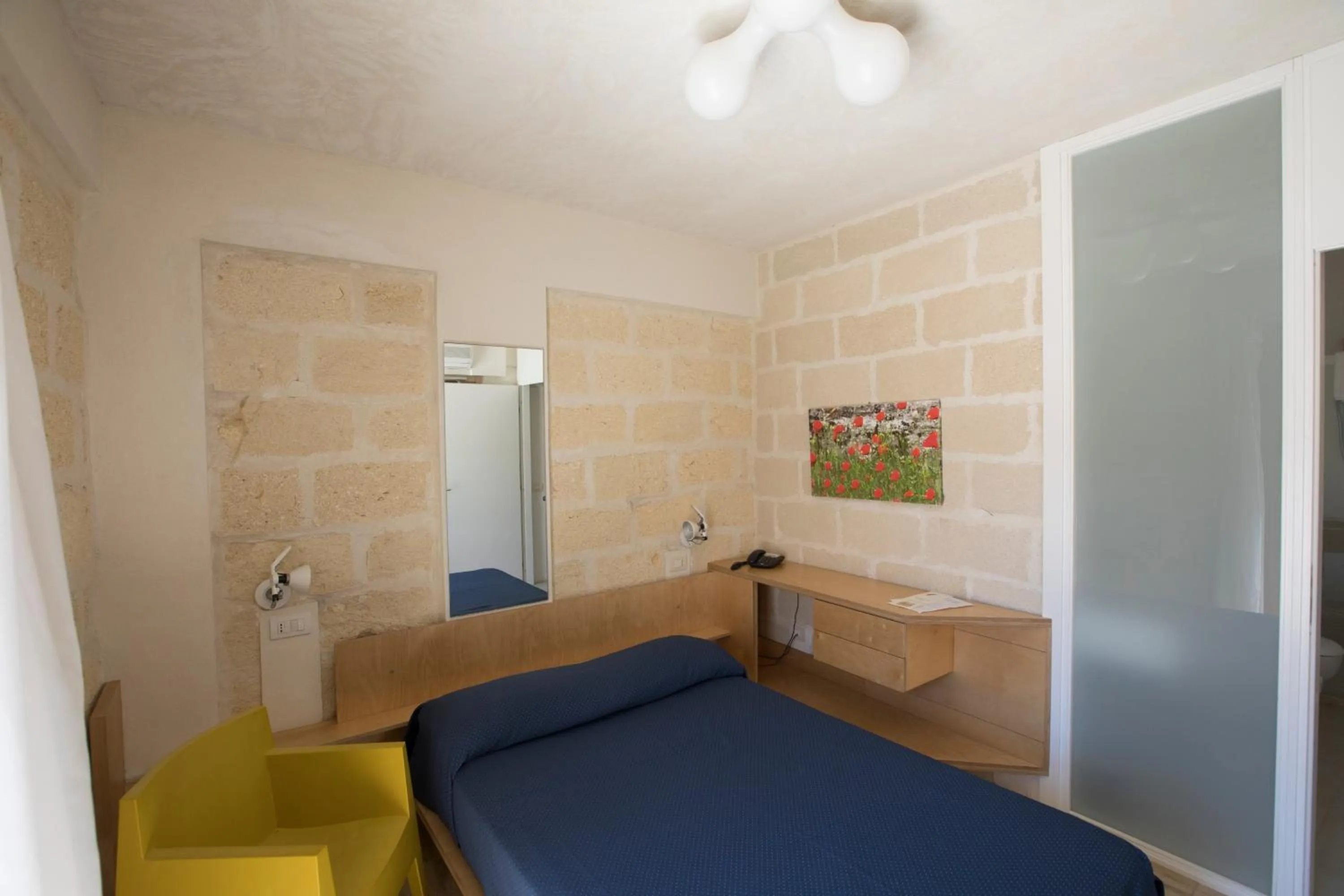 Bed in Cave Bianche Hotel