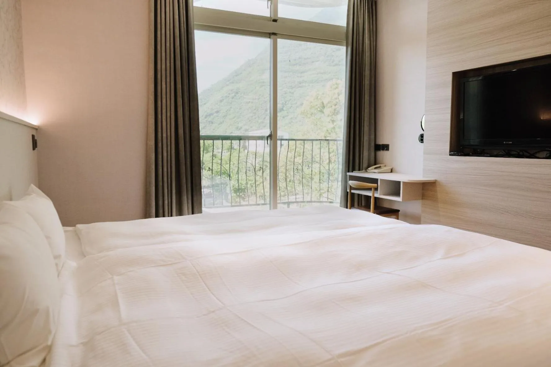 Bed in Hoping Mori Hotel