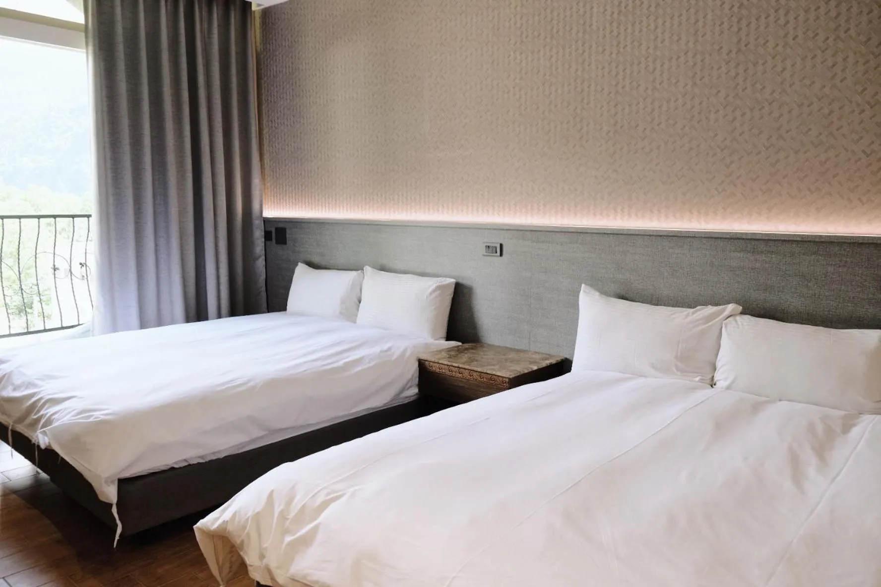 Bed in Hoping Mori Hotel