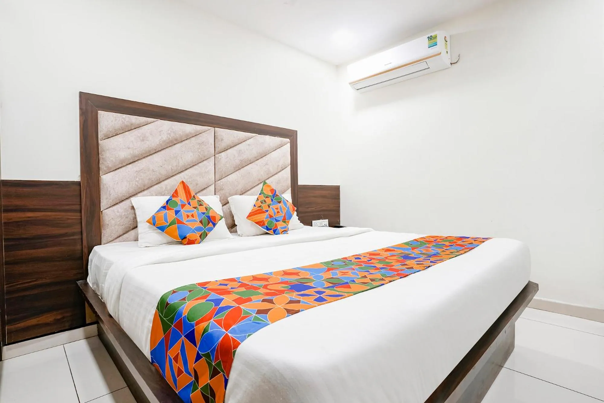 Bed in FabHotel Silver Inn