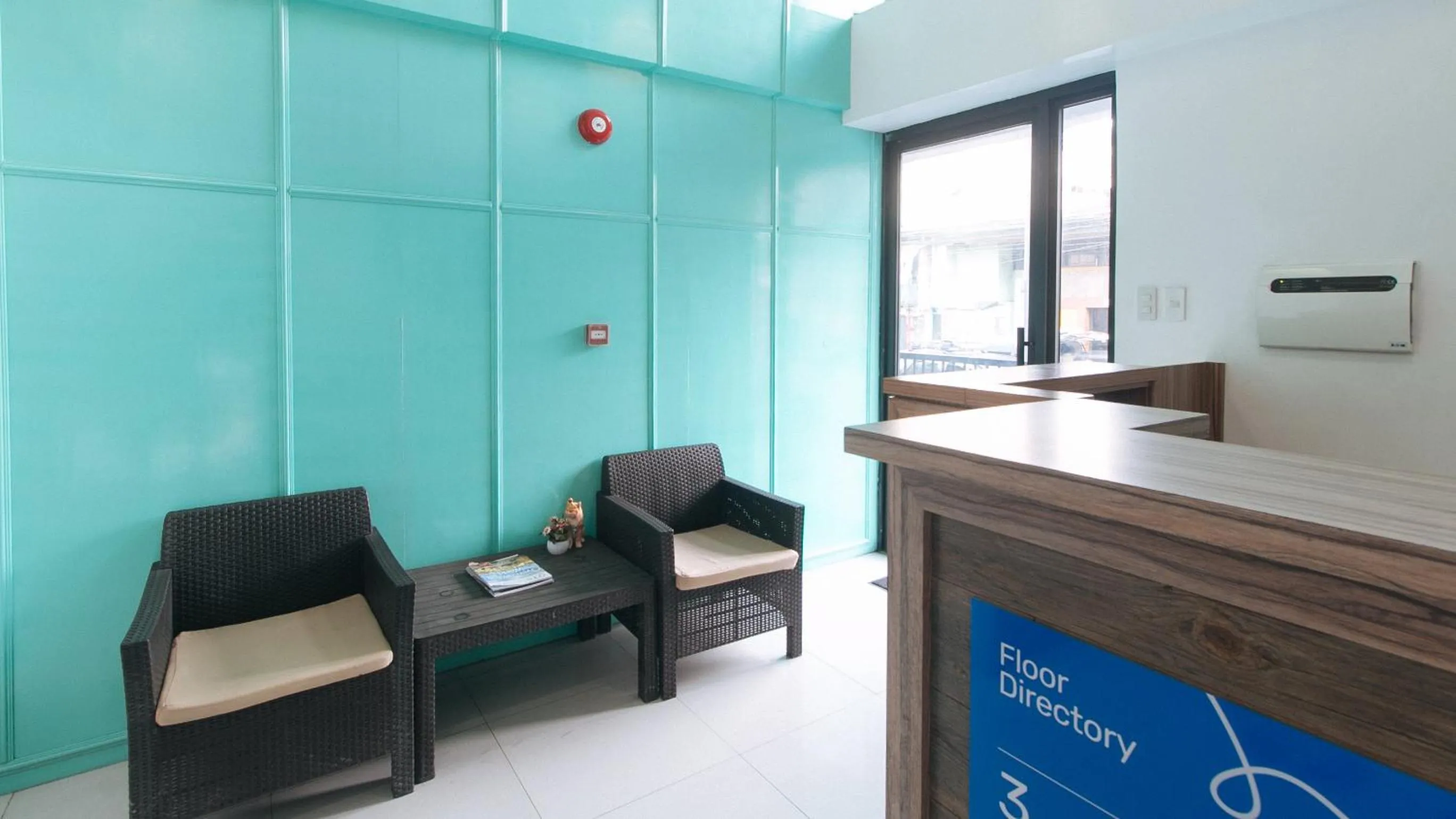 Living room in Filmore Suites Makati by RedDoorz