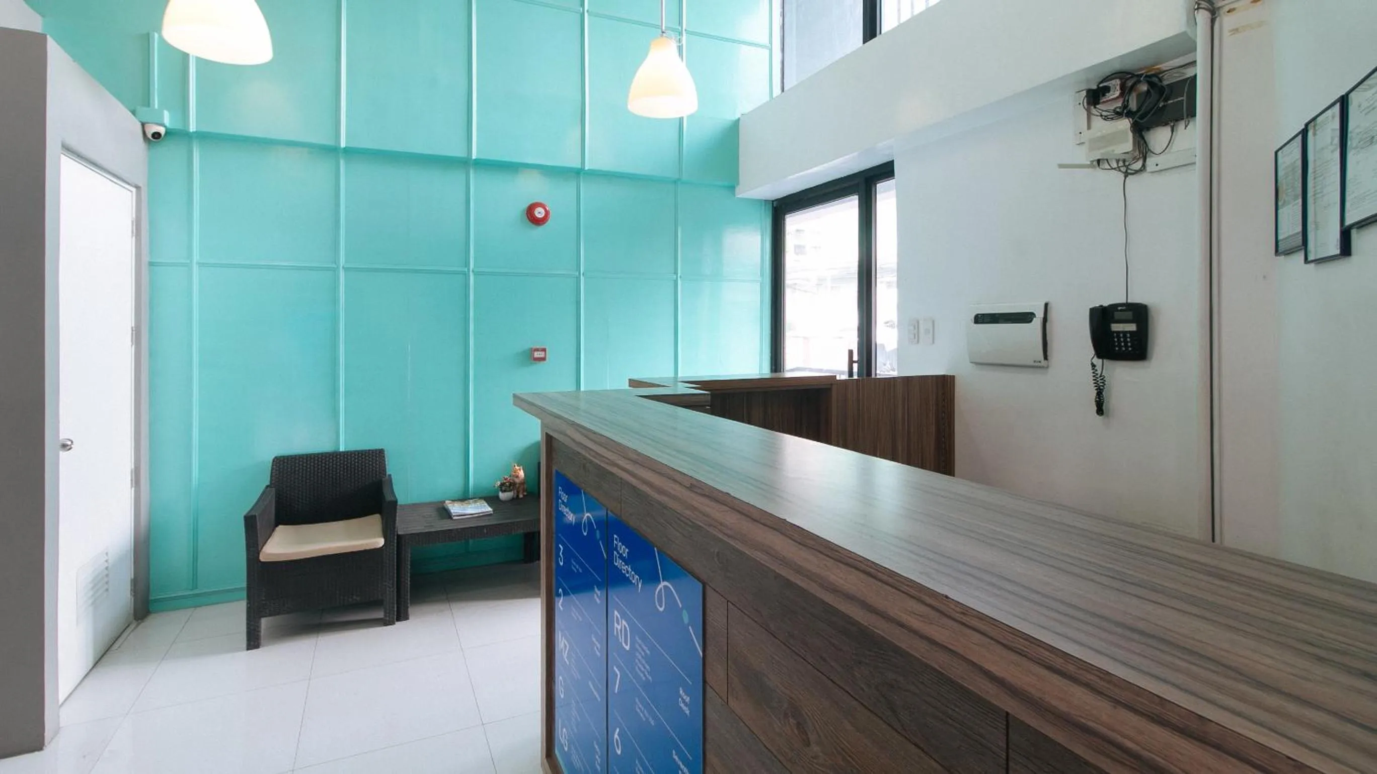 Lobby or reception in Filmore Suites Makati by RedDoorz