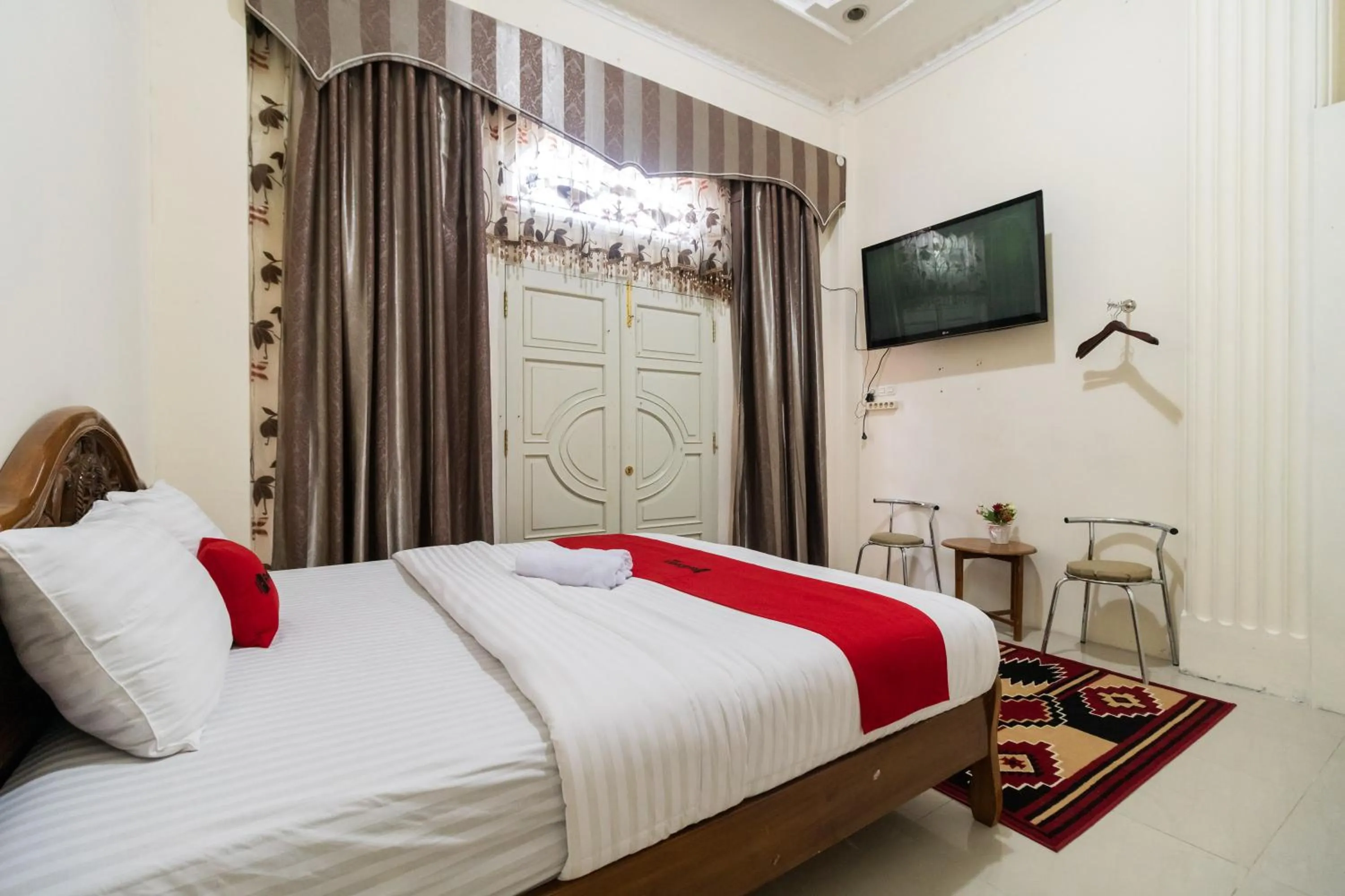 Bedroom, Bed in RedDoorz Syariah near Pasar Aur Kuning