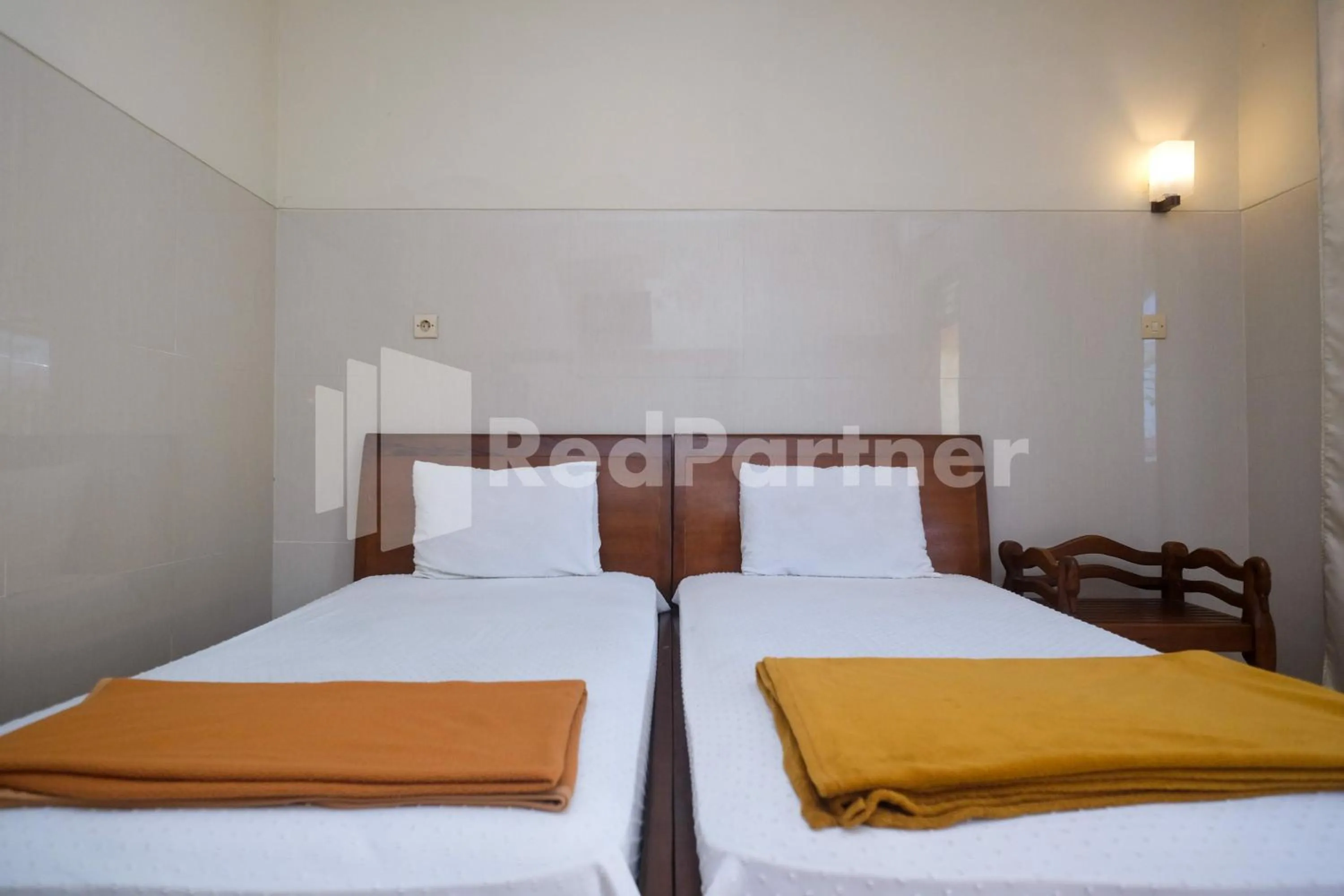 Bed in Wisma Garuda Syariah Condoongcatur Mitra RedDoorz