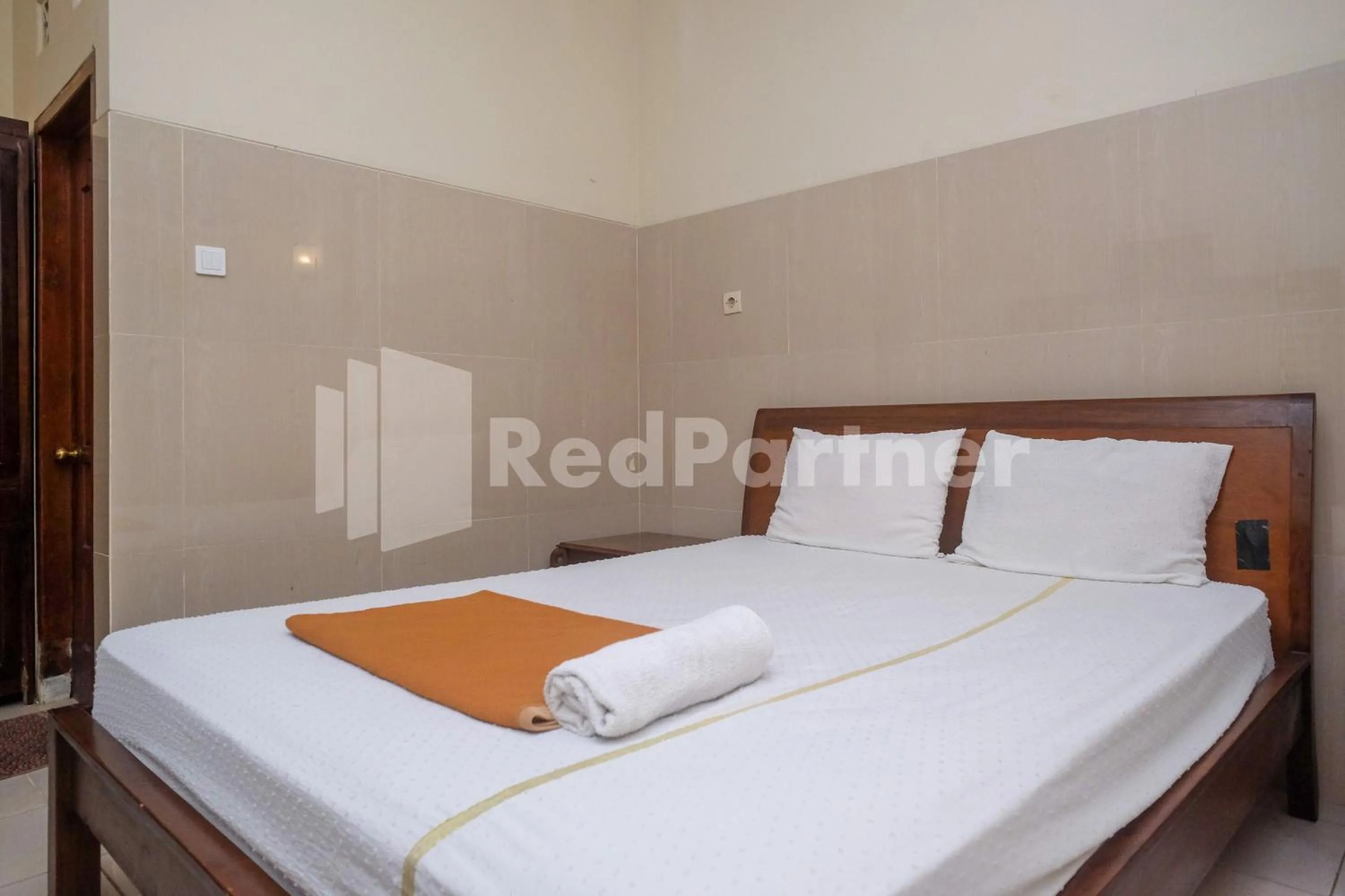 Bed in Wisma Garuda Syariah Condoongcatur Mitra RedDoorz
