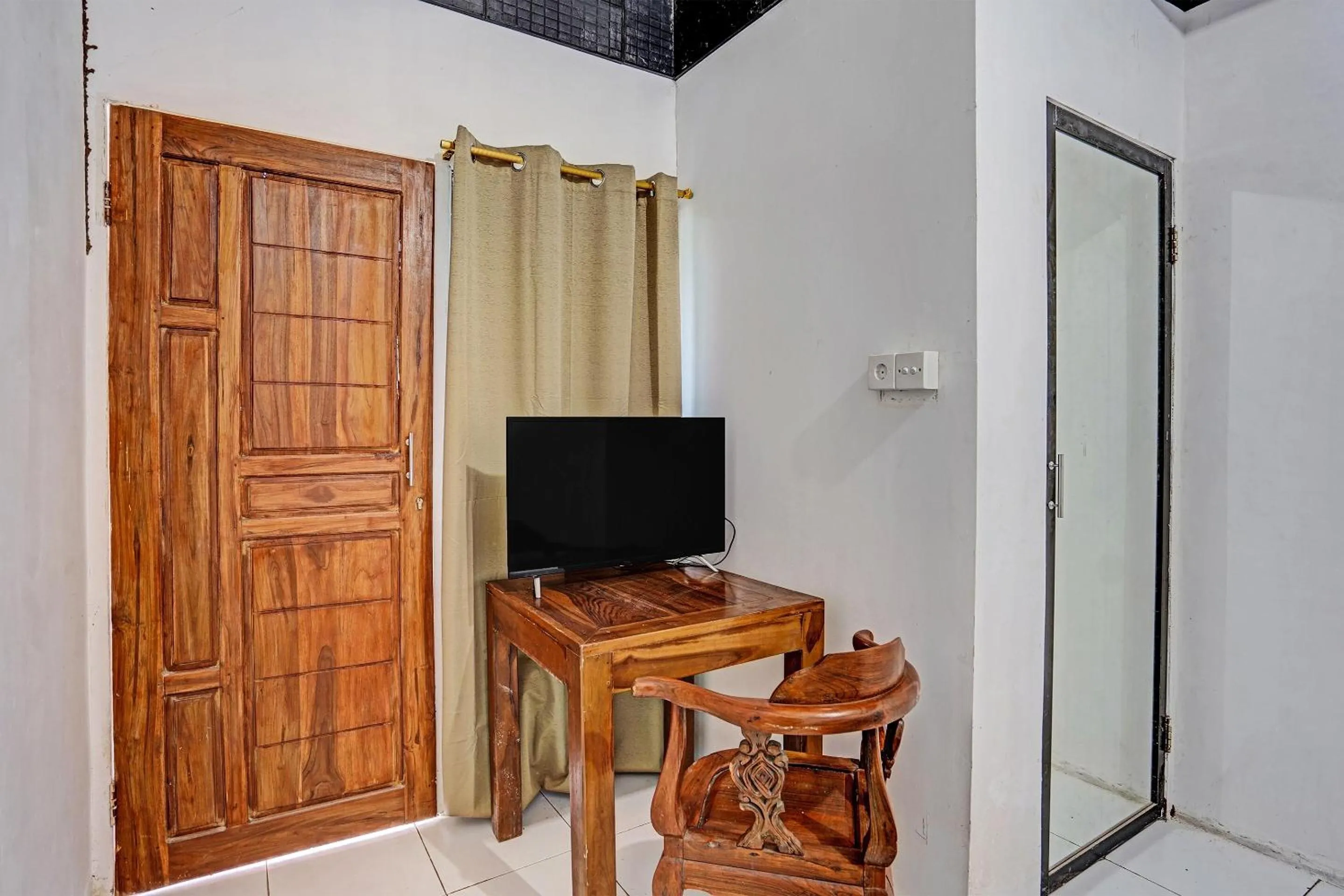 Bedroom in Hotel O Villa A1