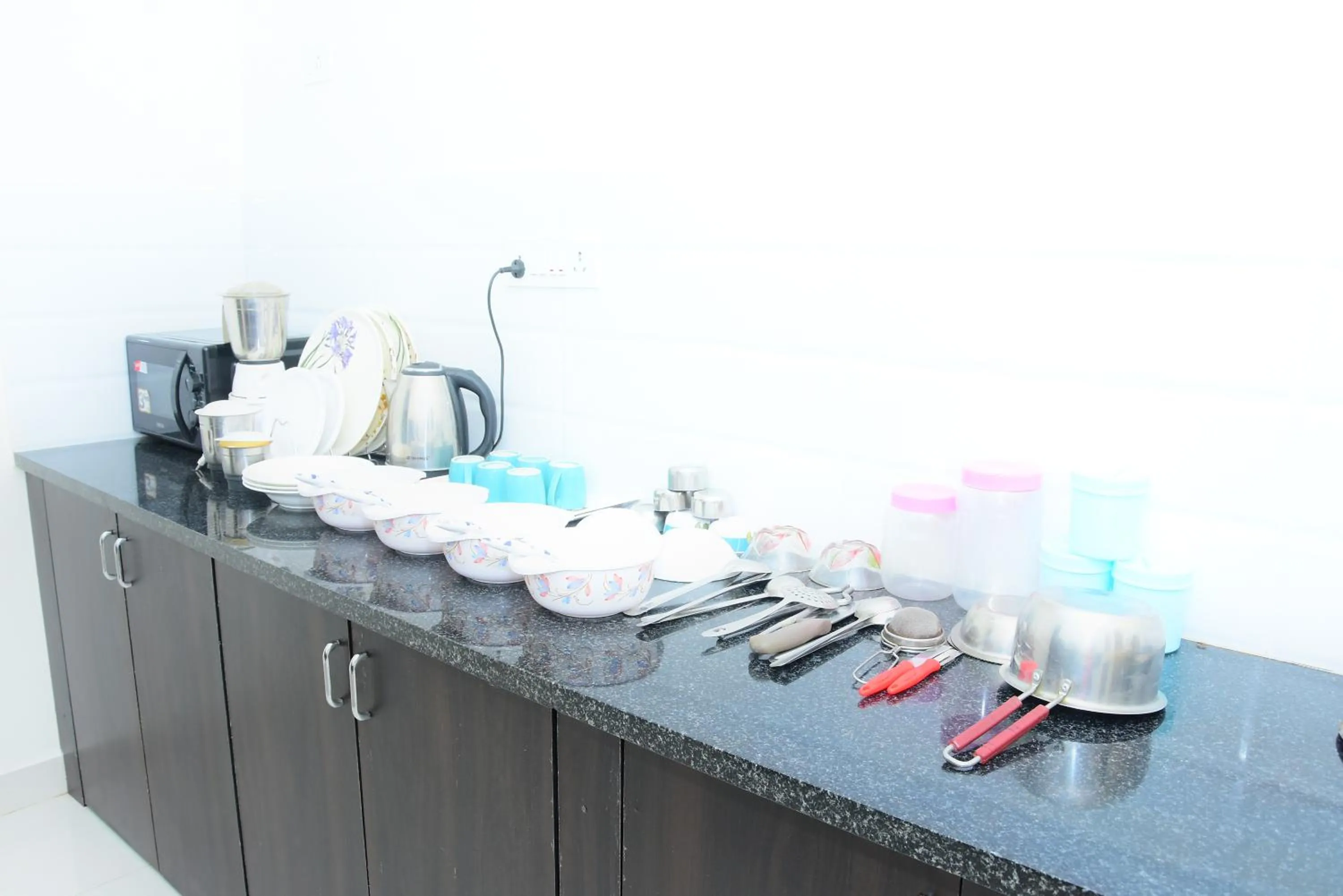 Kitchen or kitchenette in Windfall Service Apartment