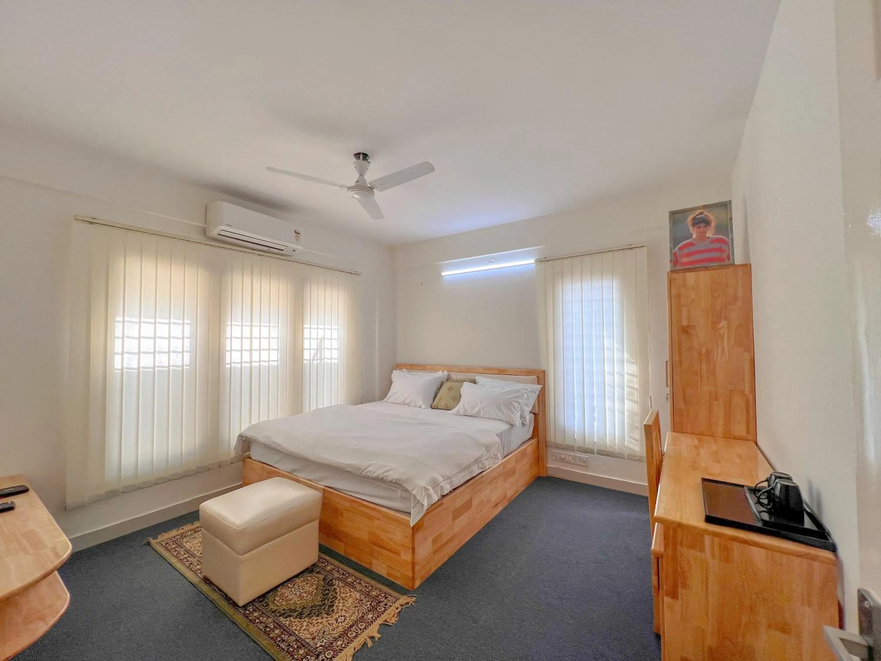 Bed in Windfall Service Apartment