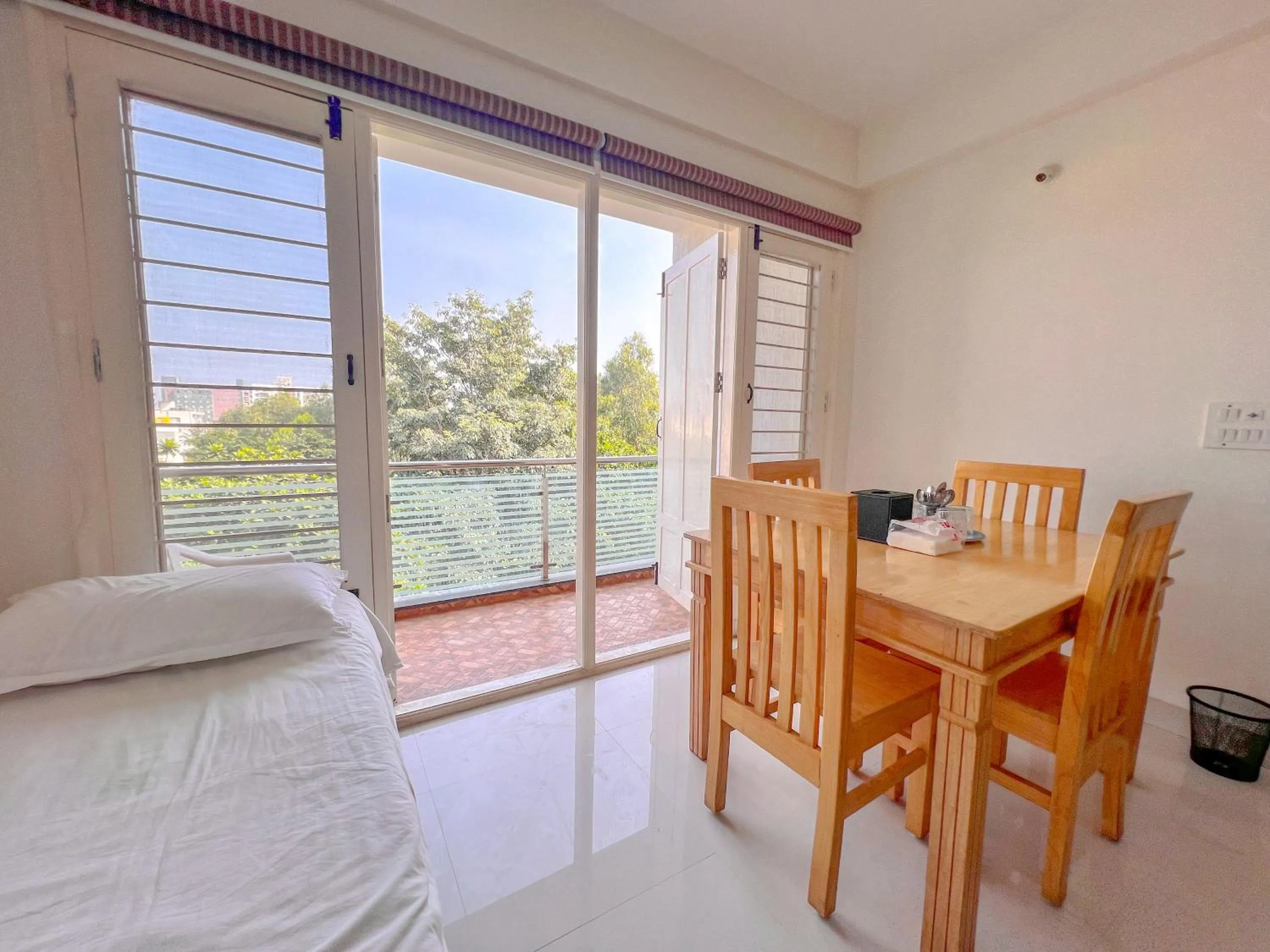 Bed in Windfall Service Apartment