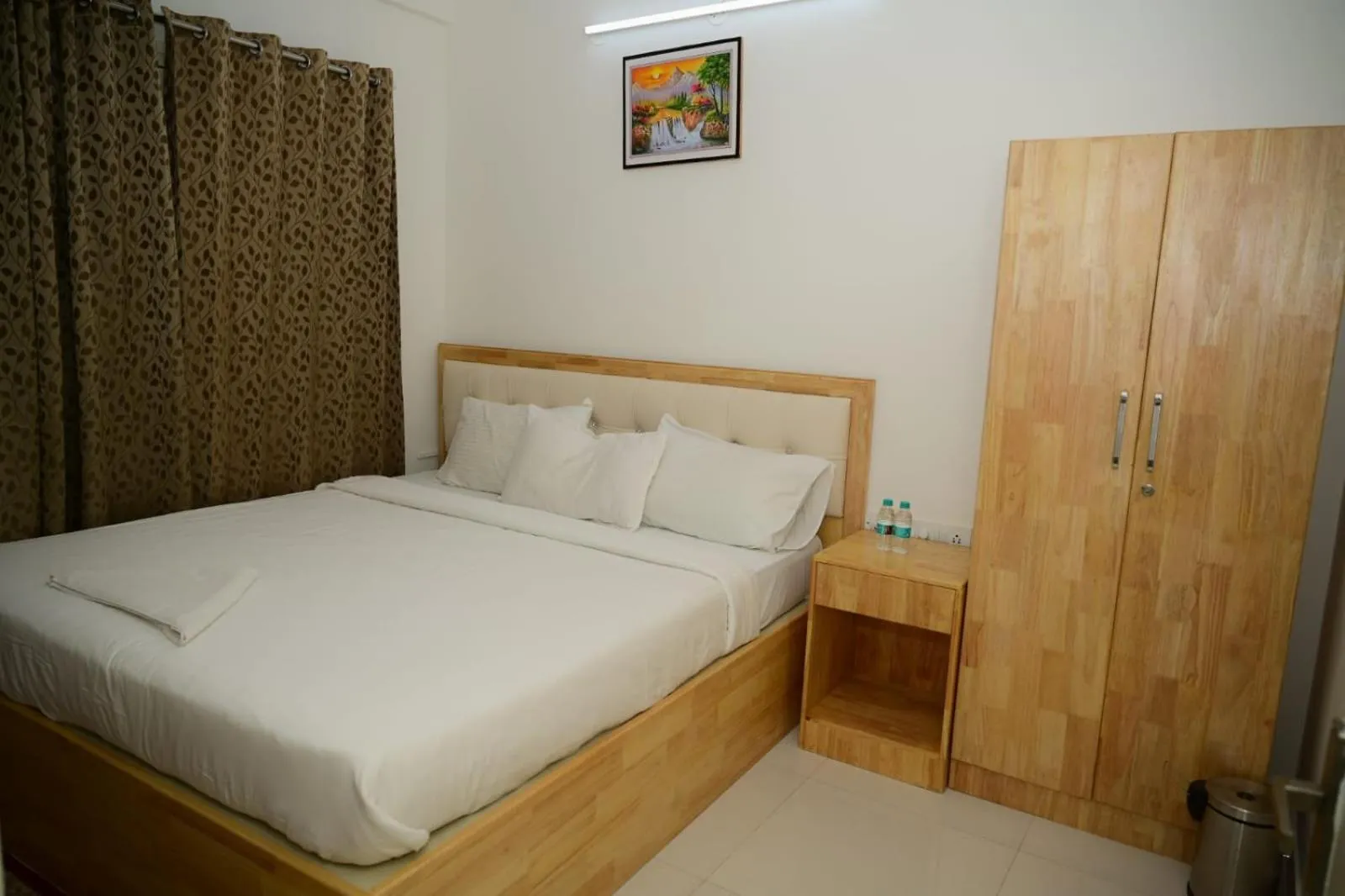 Bed in Windfall Service Apartment