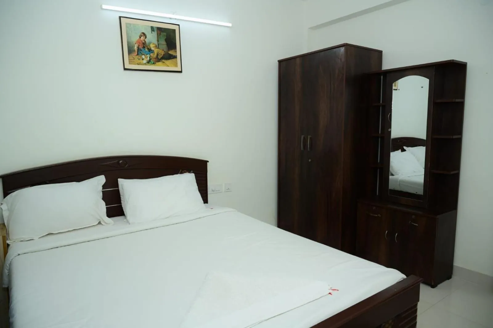 Bed in Windfall Service Apartment