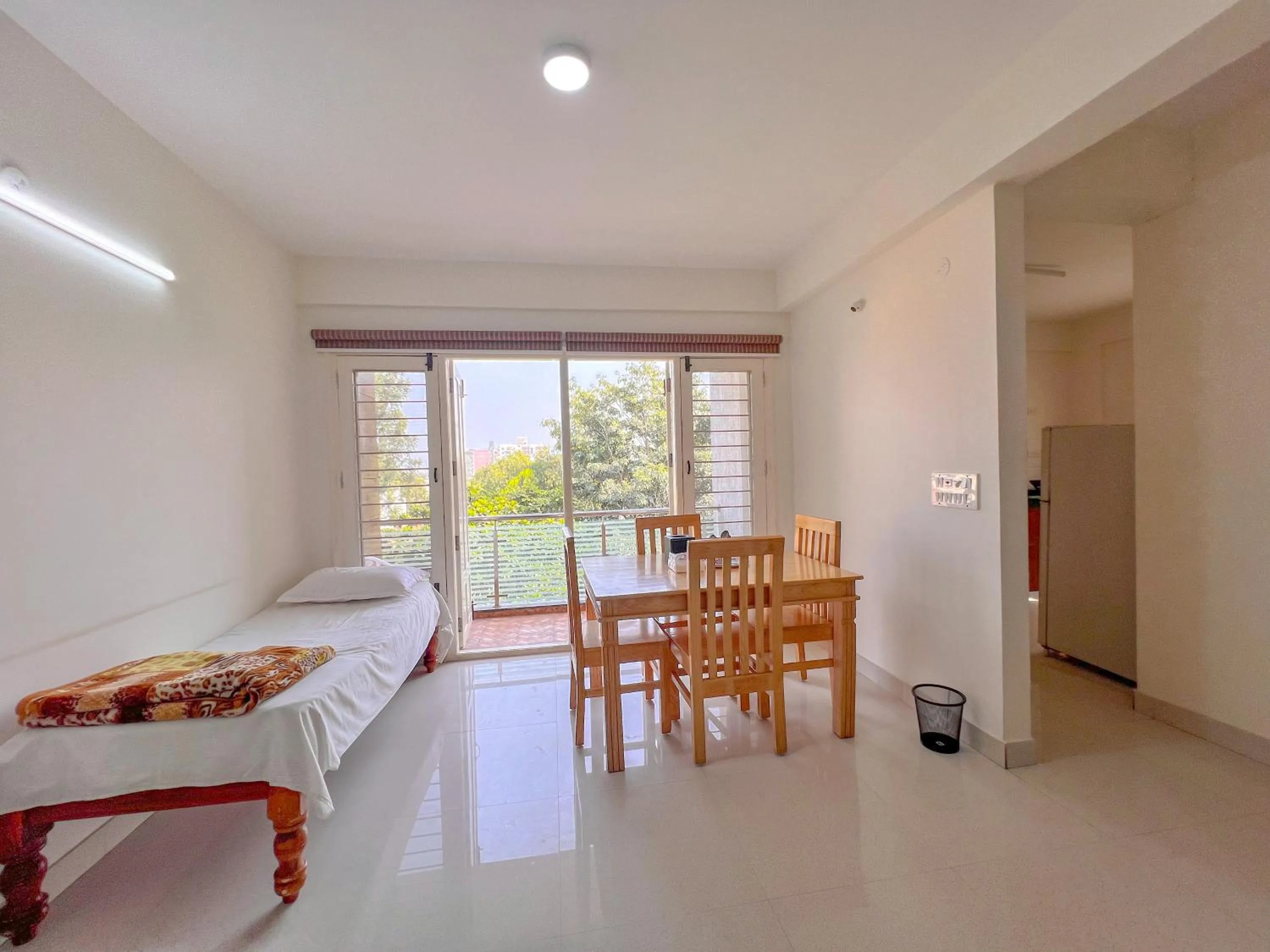 Bed in Windfall Service Apartment