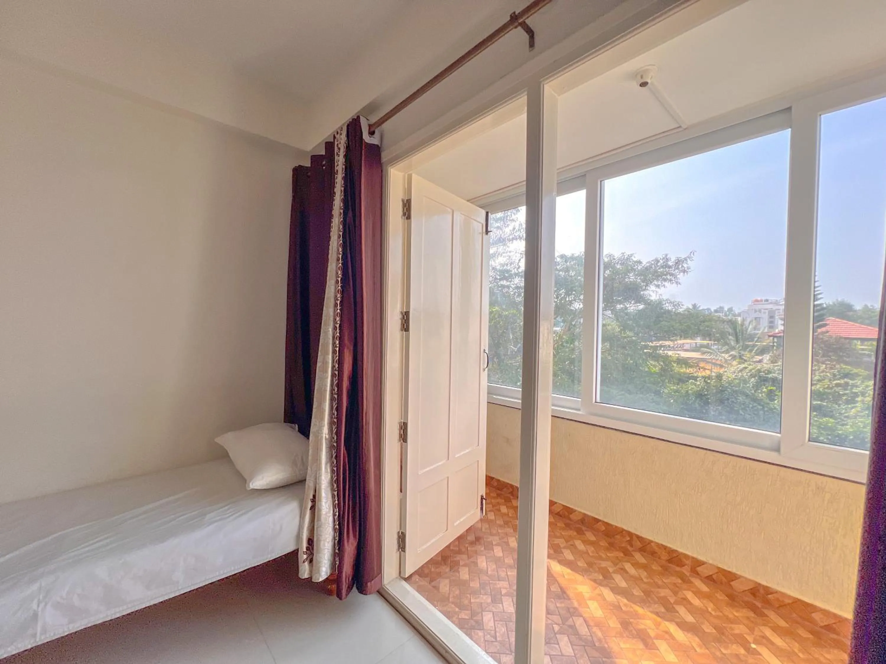 Bed in Windfall Service Apartment