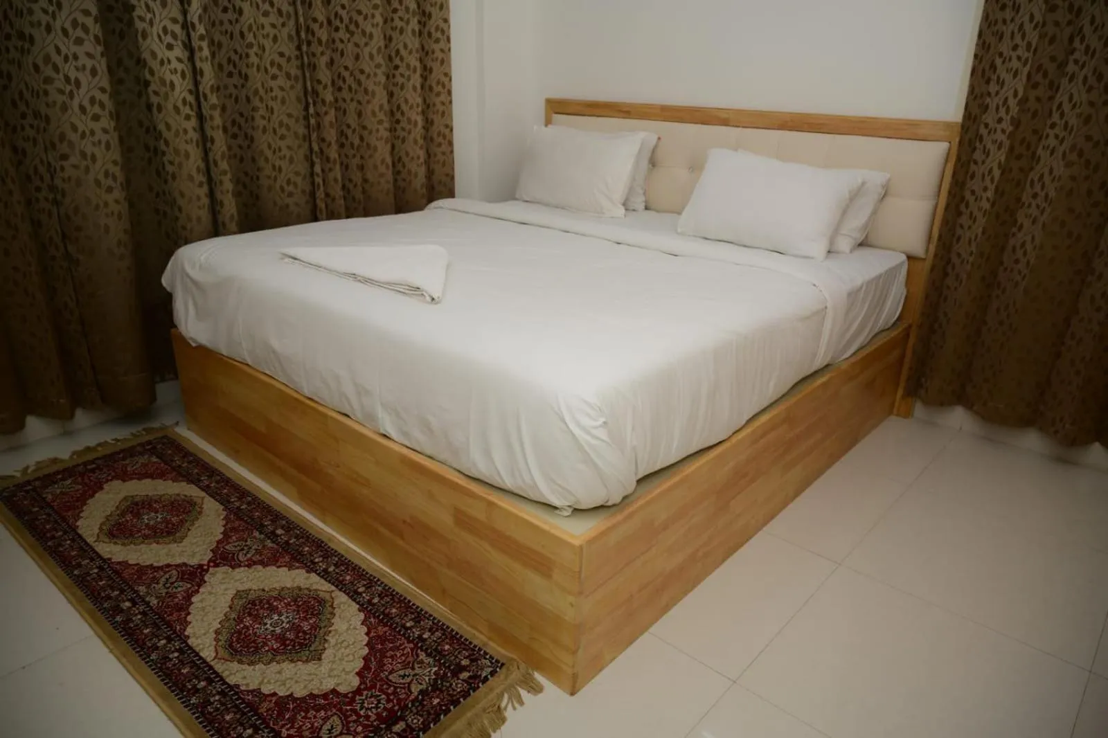 Bed in Windfall Service Apartment