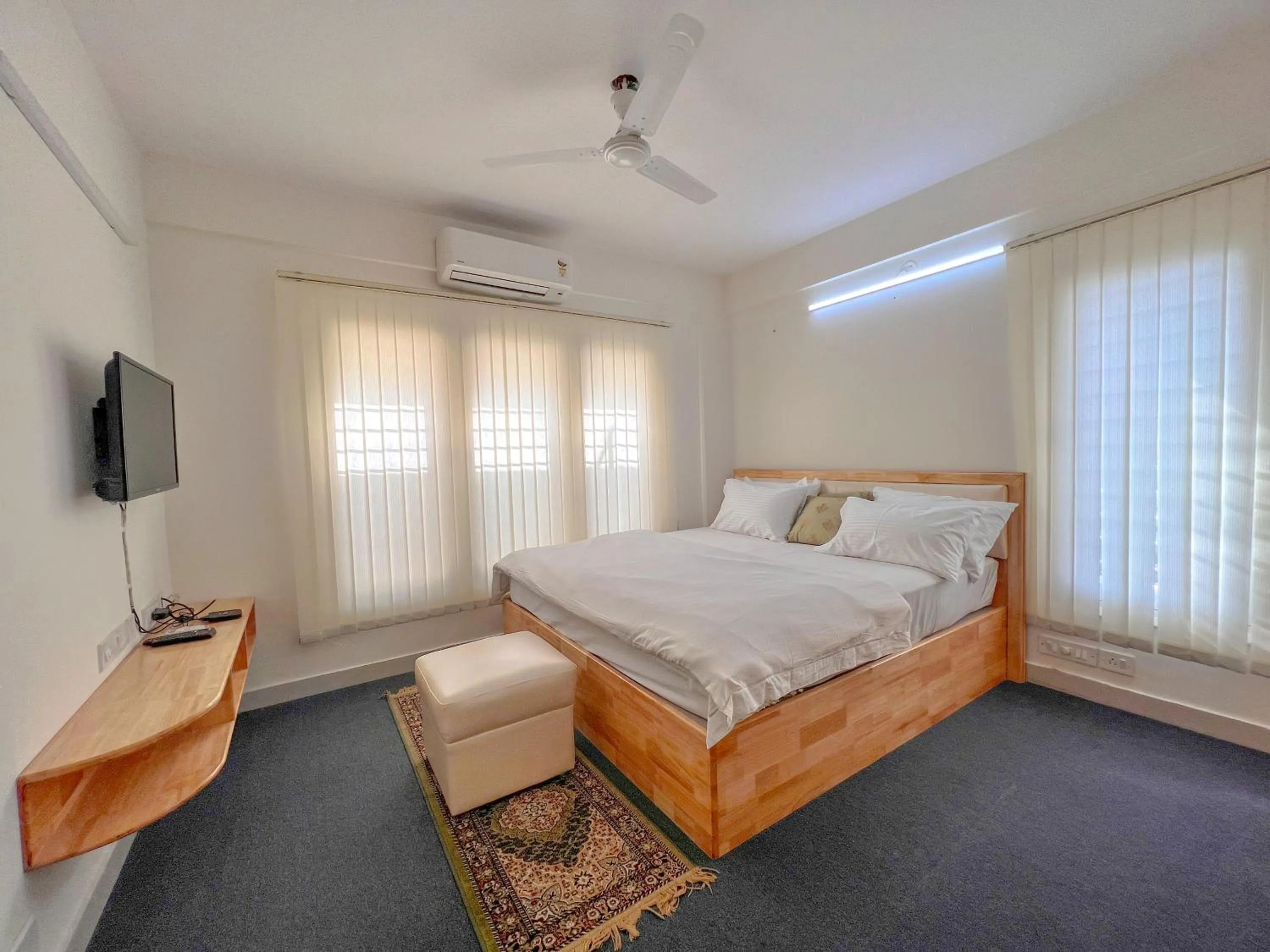 Bed in Windfall Service Apartment