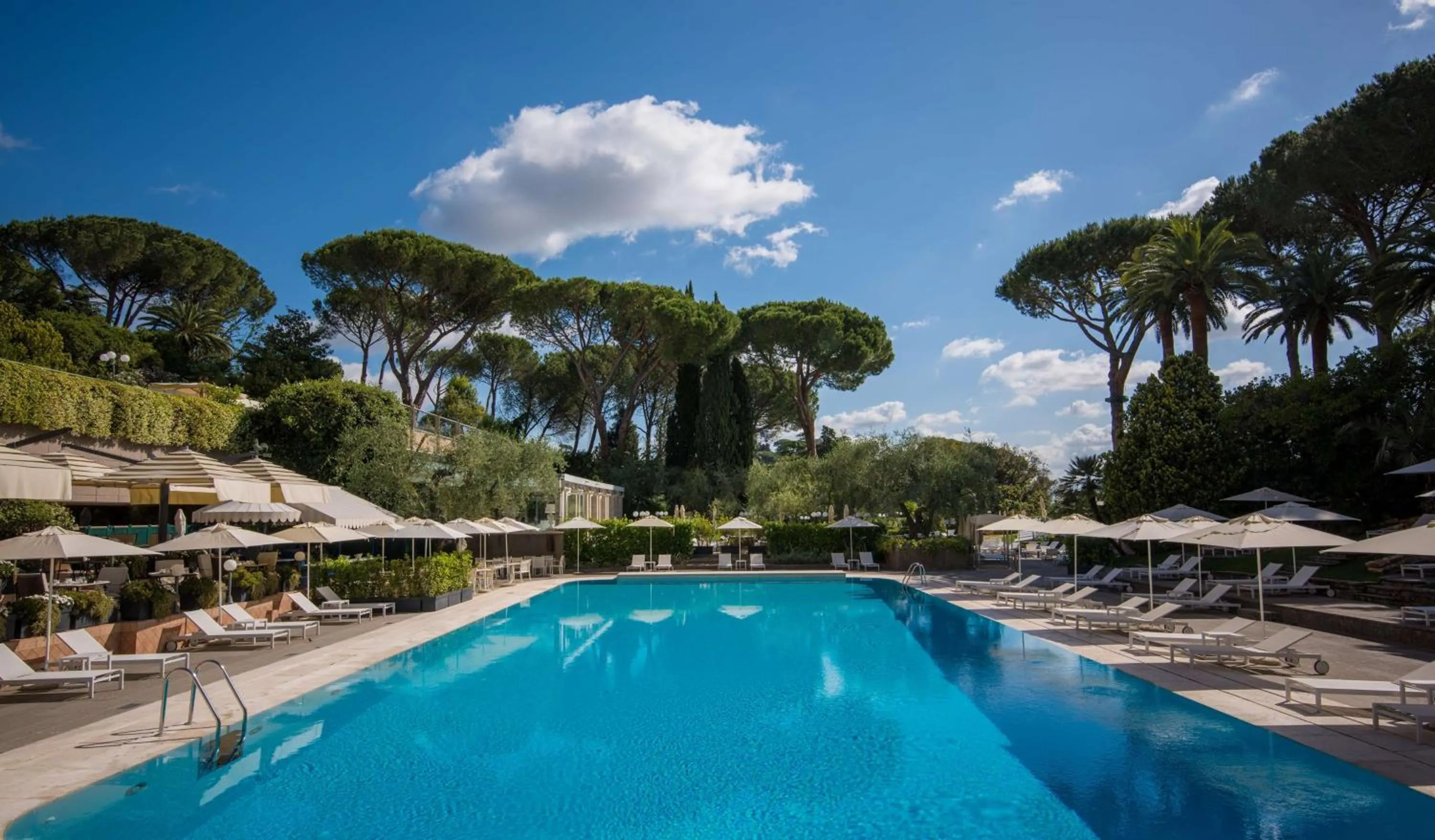 Pool view in Rome Cavalieri, A Waldorf Astoria Hotel